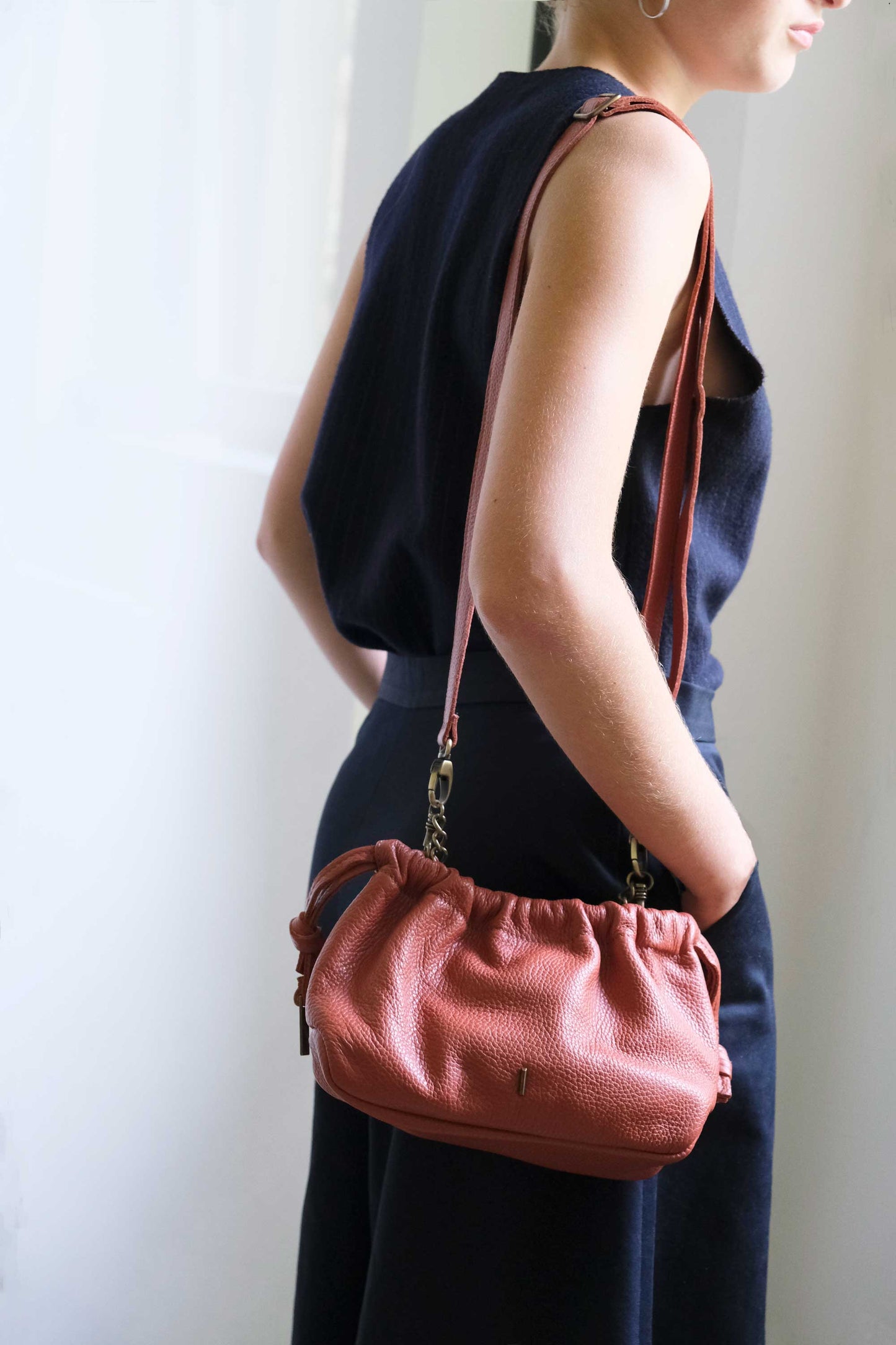 Agnes mini pochette in brick soft leather