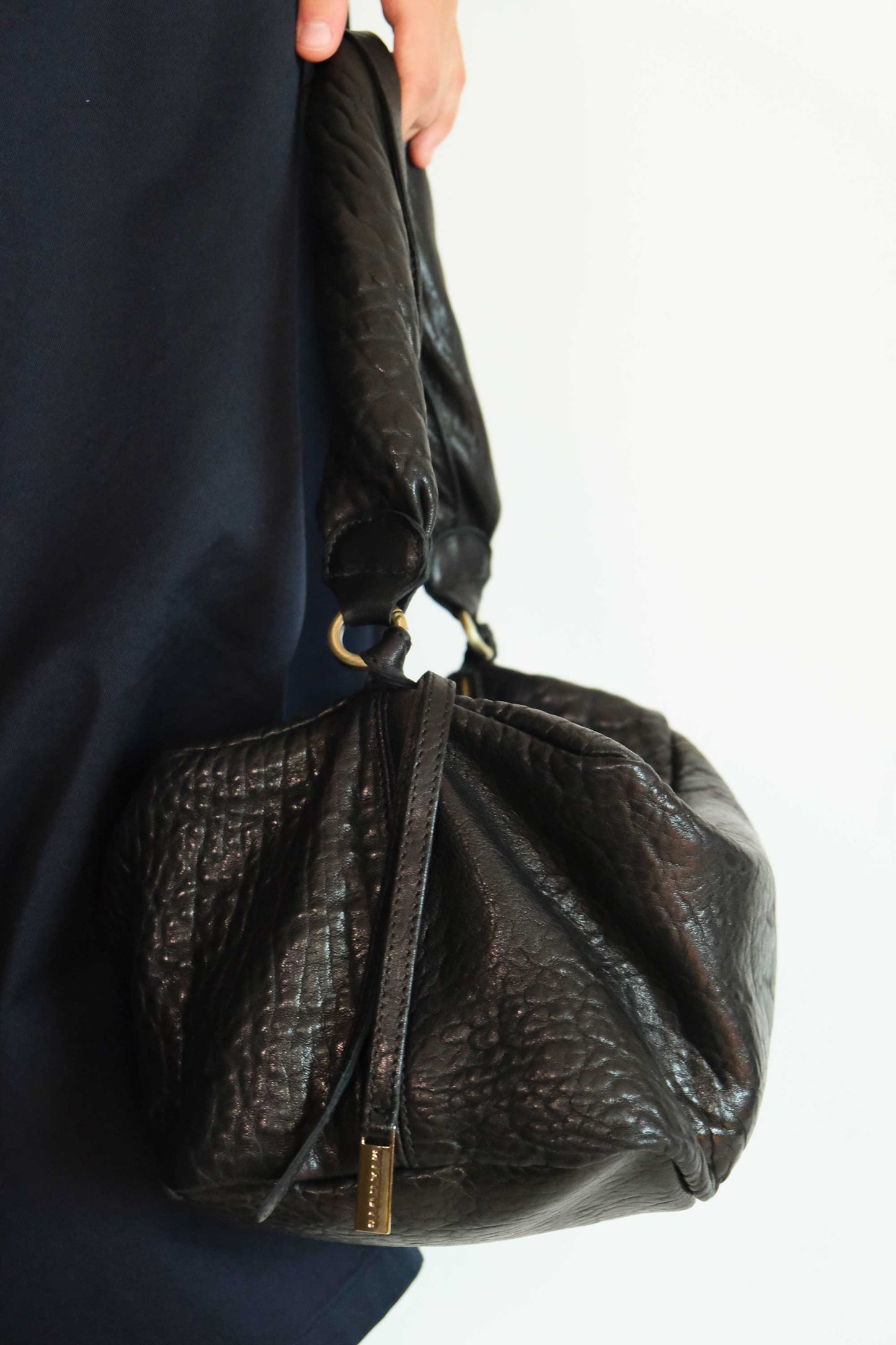 Bobo Torchon top handle bag in mutton vegetable leather