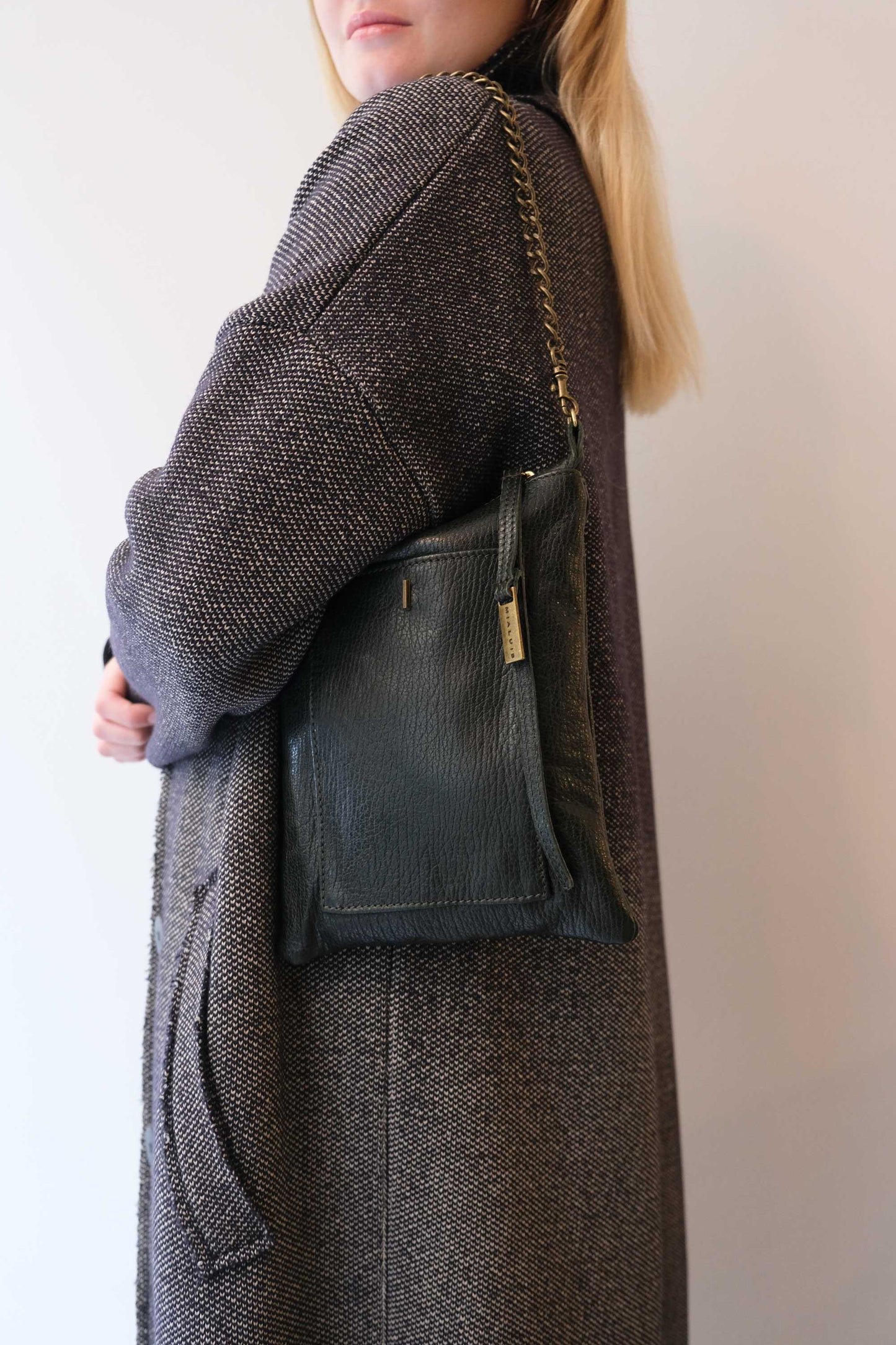Rina pochette pine green vegetable tanned leather with shark print