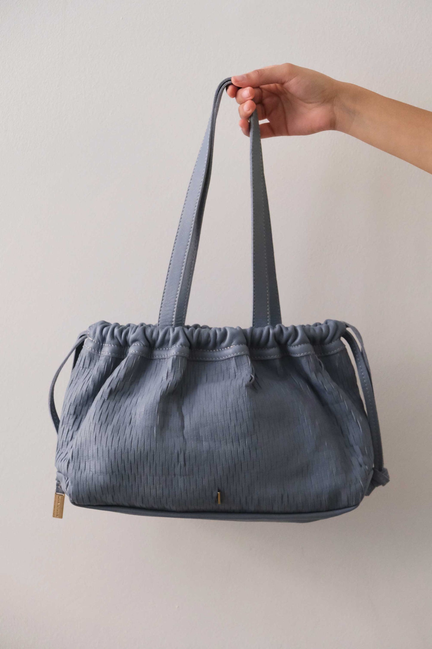 Agnes bucket in rain perforated leather - Made in Italy -