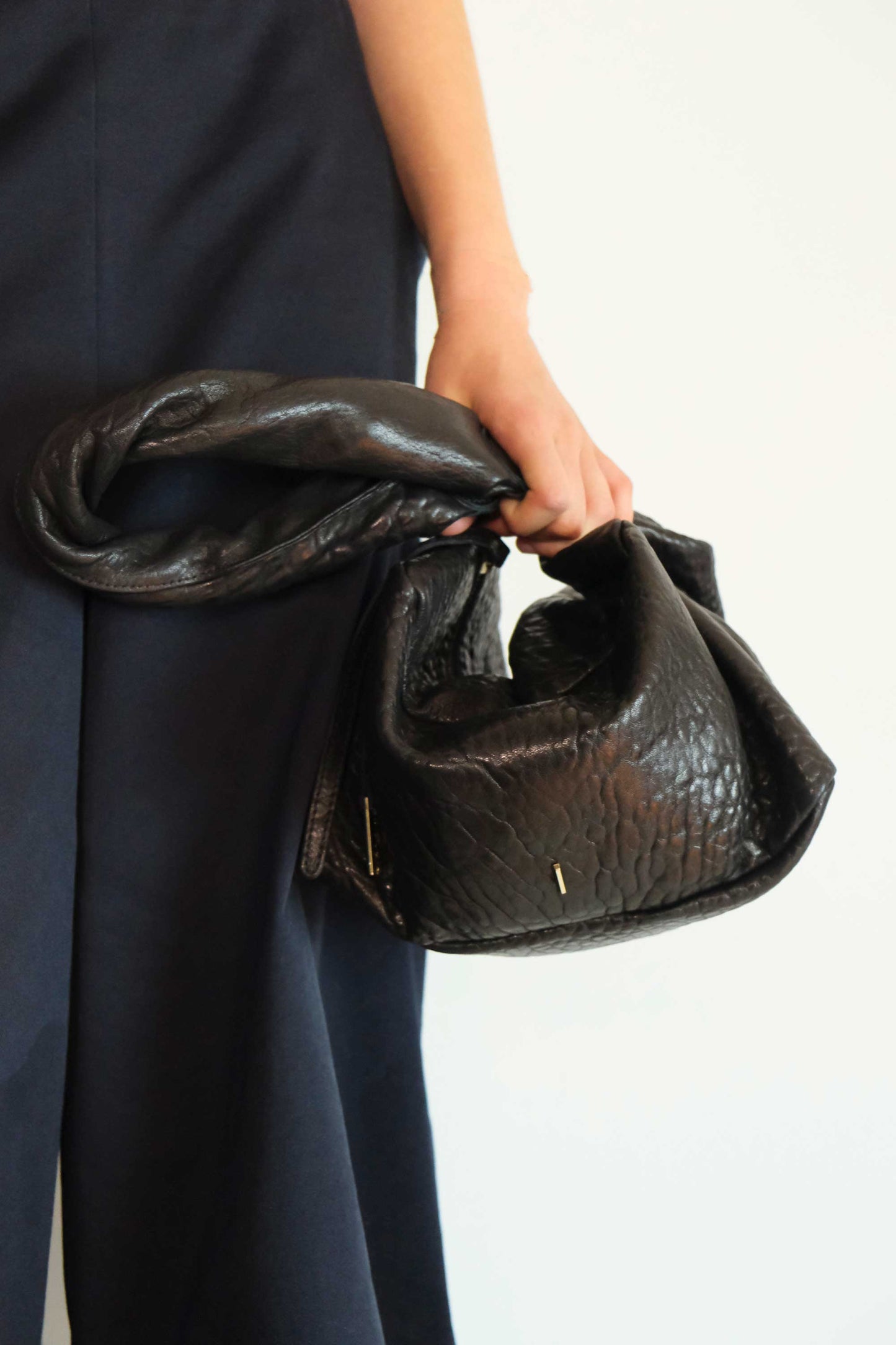 Bobo Torchon top handle bag in mutton vegetable leather