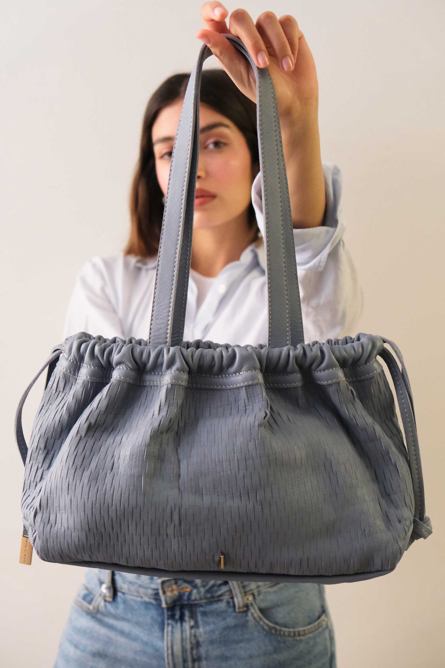 Agnes bucket in rain perforated leather - Made in Italy -