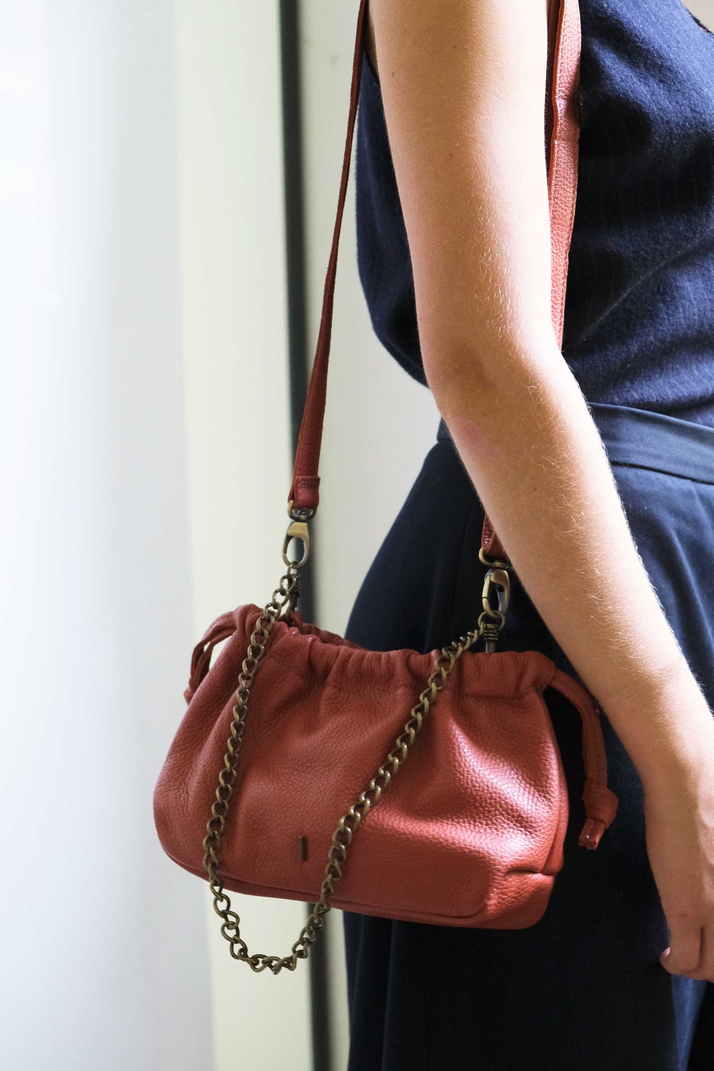 Agnes mini pochette in brick soft leather