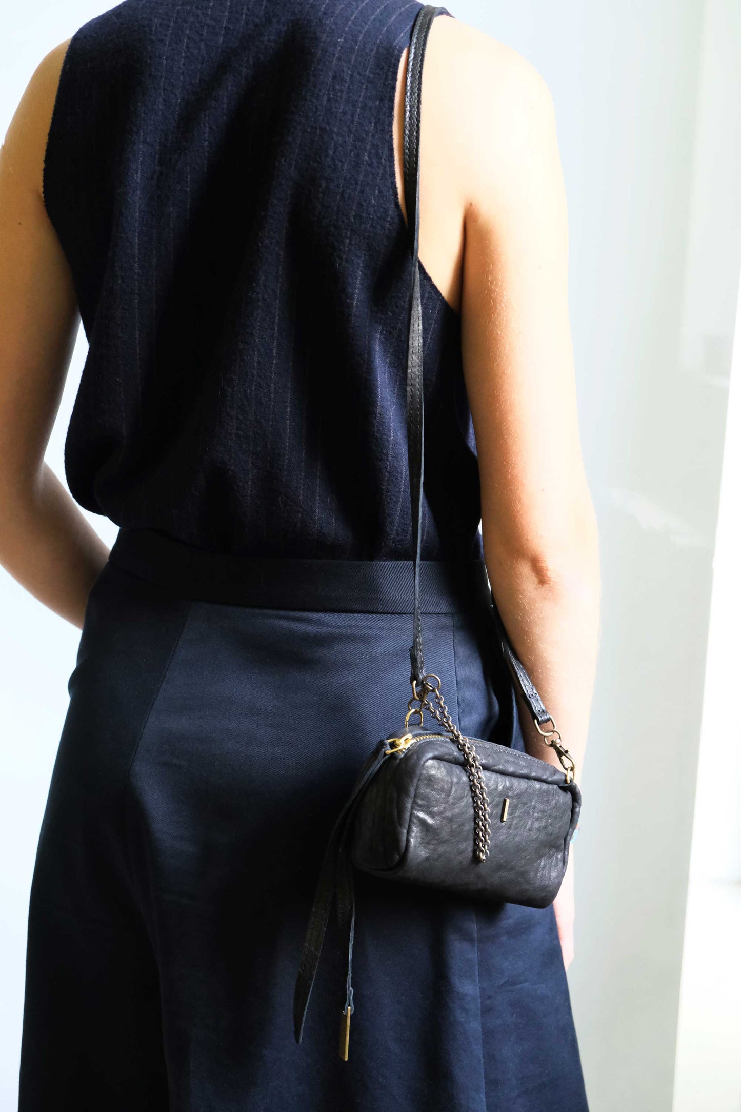 Bombo pochette in in mutton vegetable leather