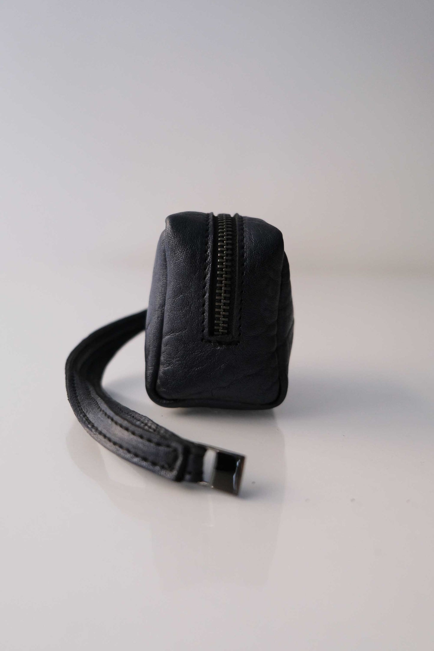 Dream box mini pochette in navy soft leather