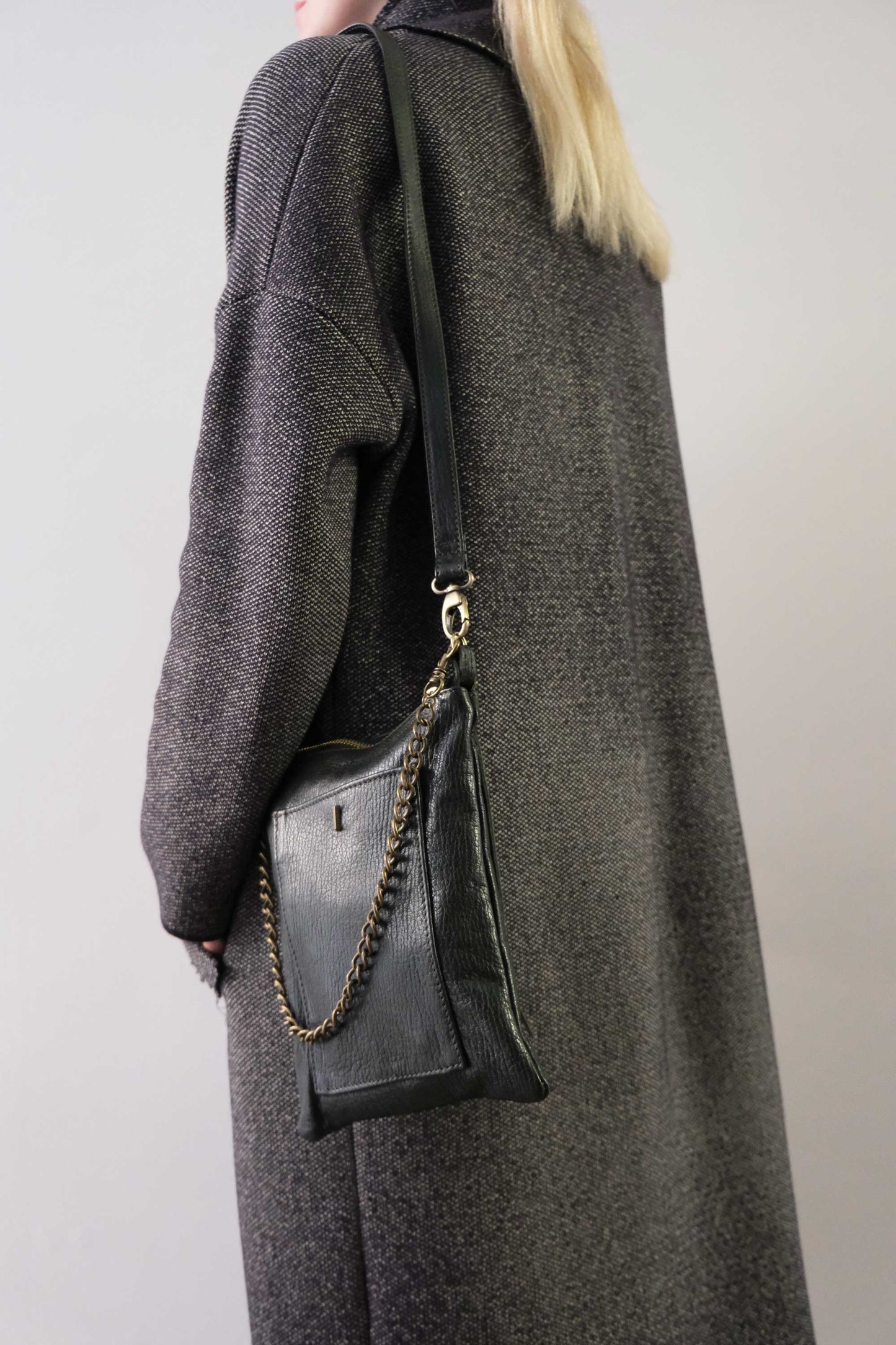 Rina pochette pine green vegetable tanned leather with shark print
