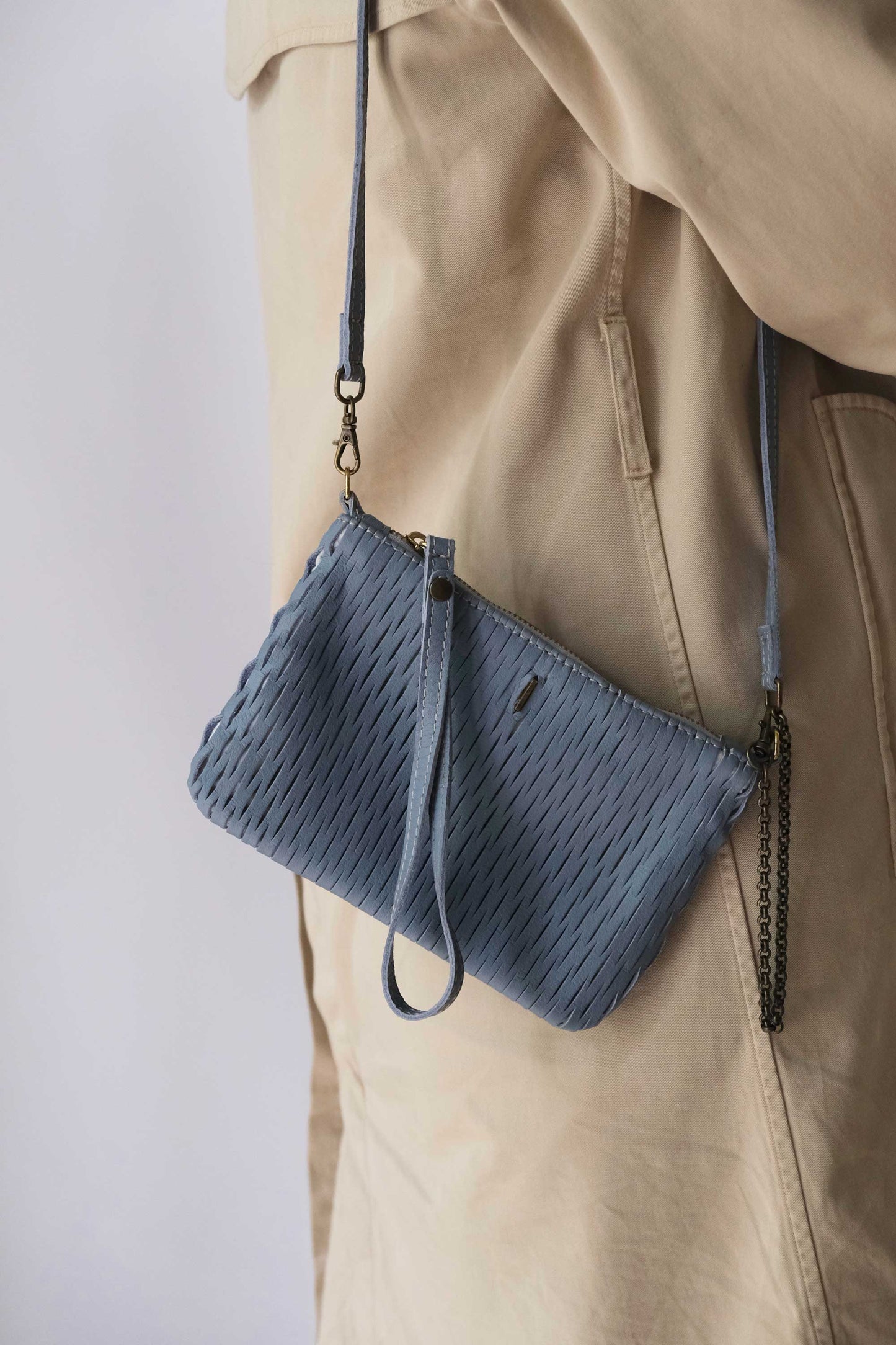 Tina pochette in cielo perforated leather