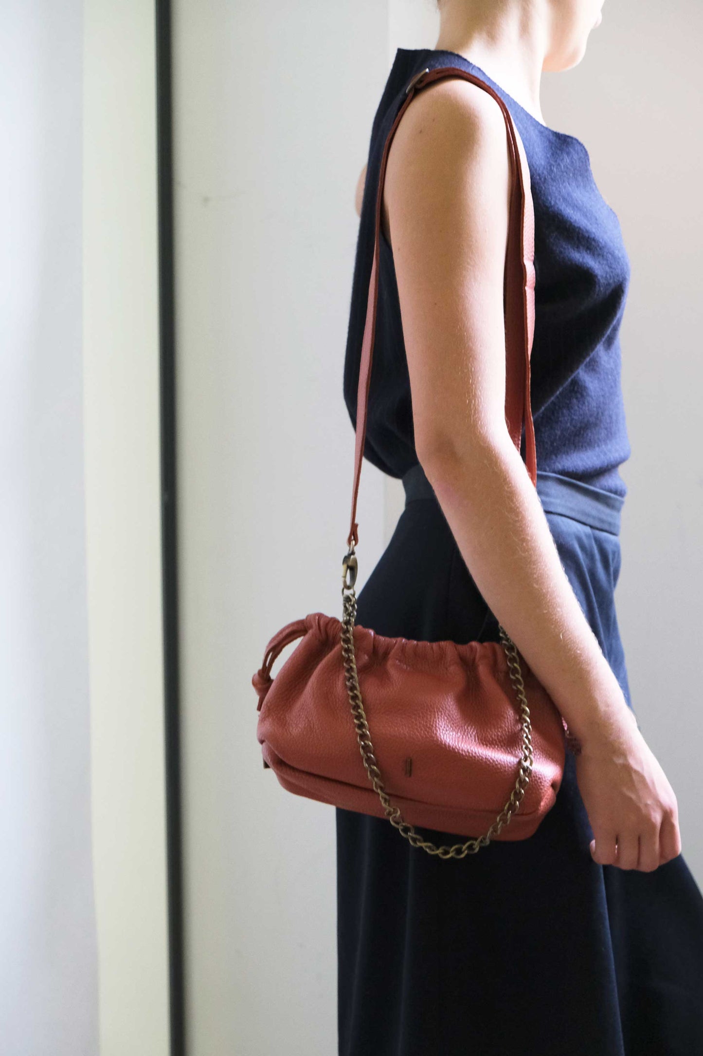 Agnes mini pochette in brick soft leather