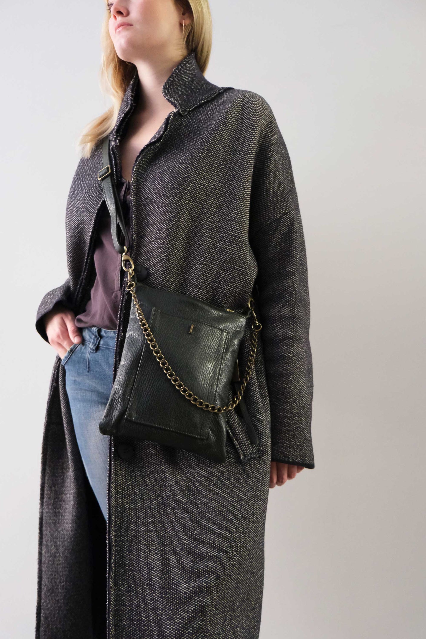 Rina pochette pine green vegetable tanned leather with shark print