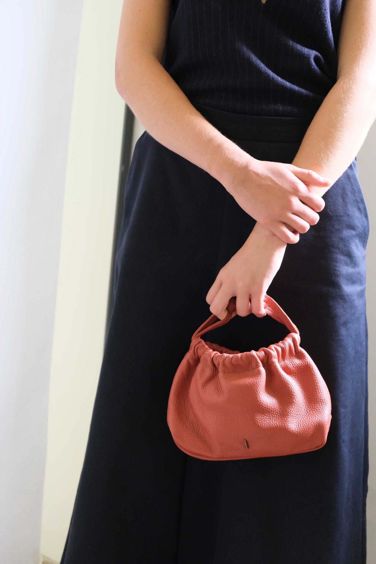 Agnes mini pochette in brick soft leather