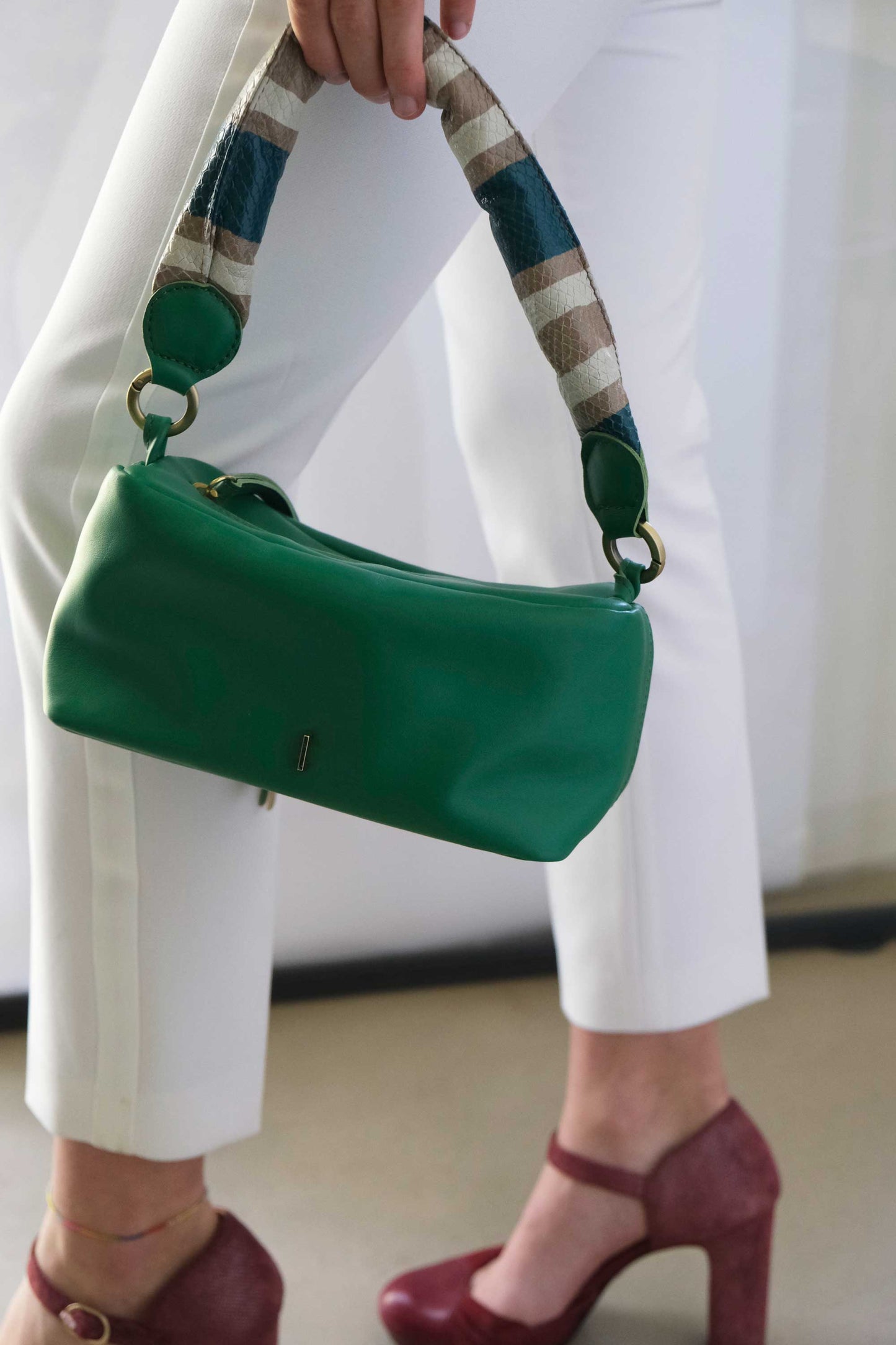 Bobo mini emerald green leather with teal striped handle