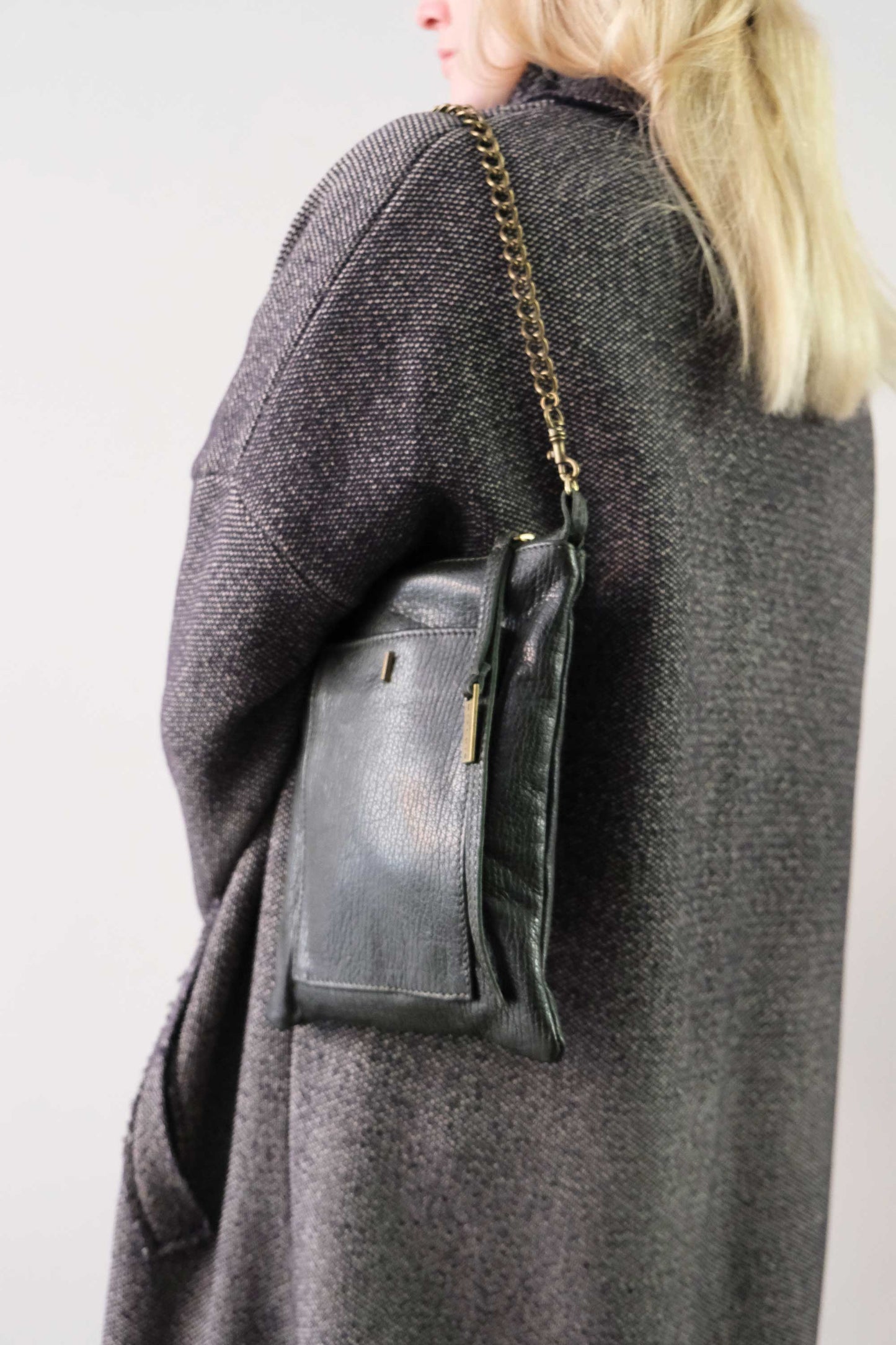 Rina pochette pine green vegetable tanned leather with shark print