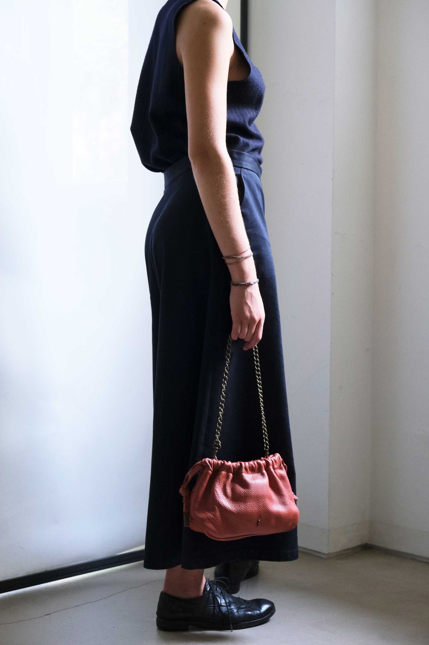 Agnes mini pochette in brick soft leather
