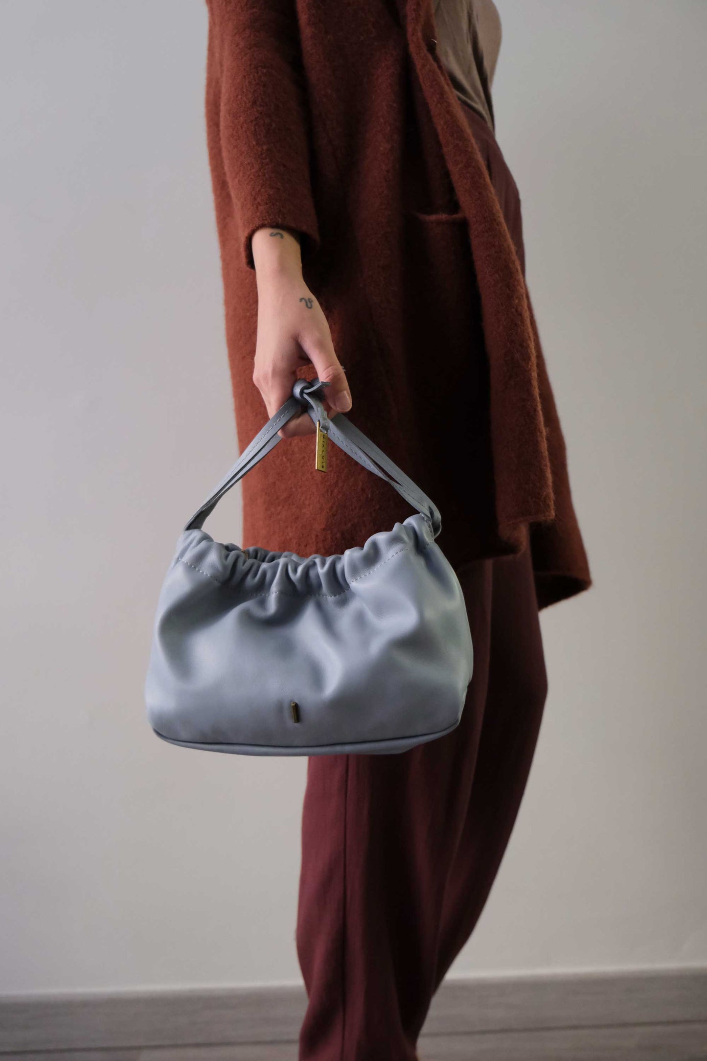 Agnes mini pochette in sky soft leather