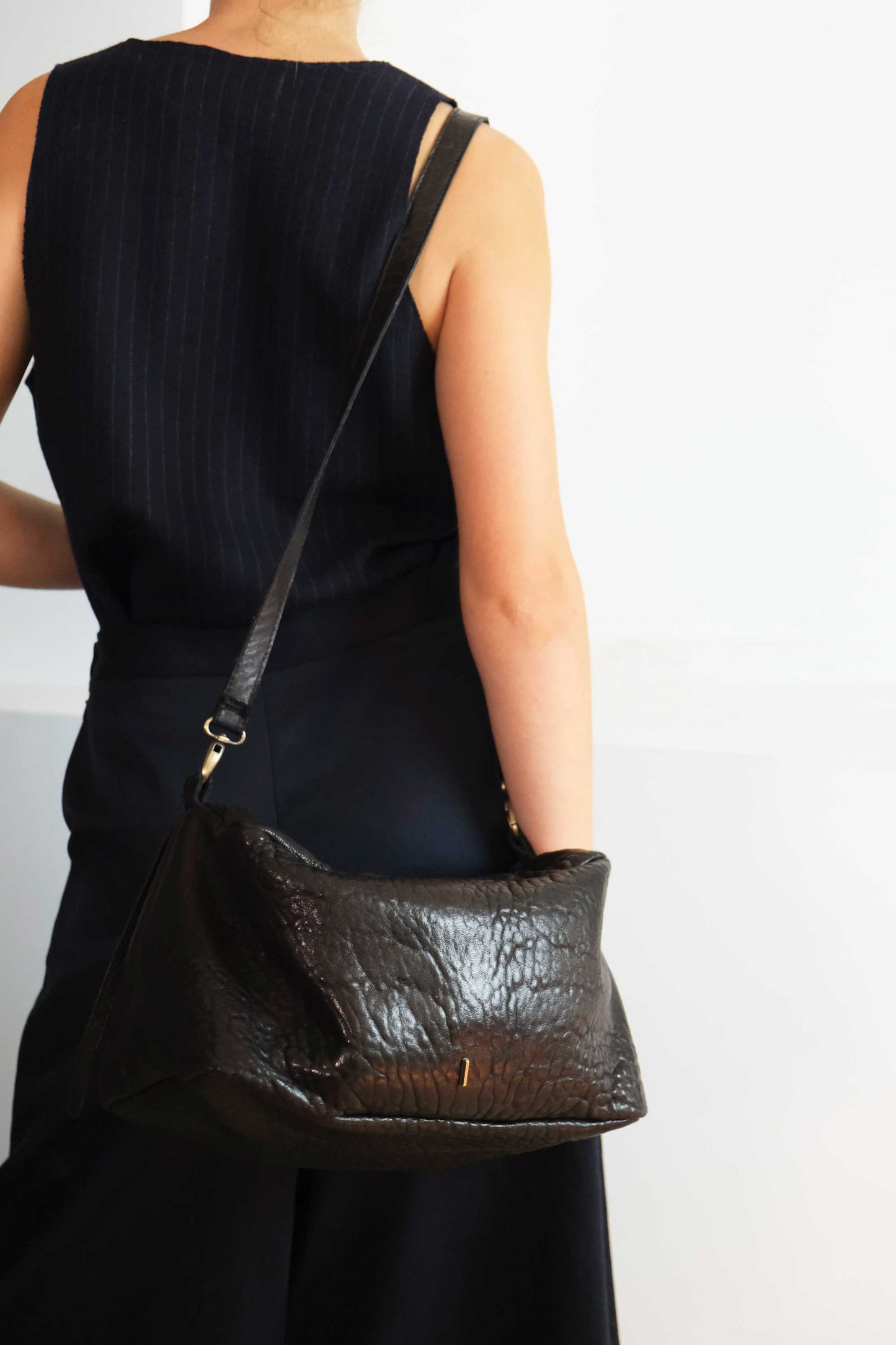 Bobo Torchon top handle bag in mutton vegetable leather