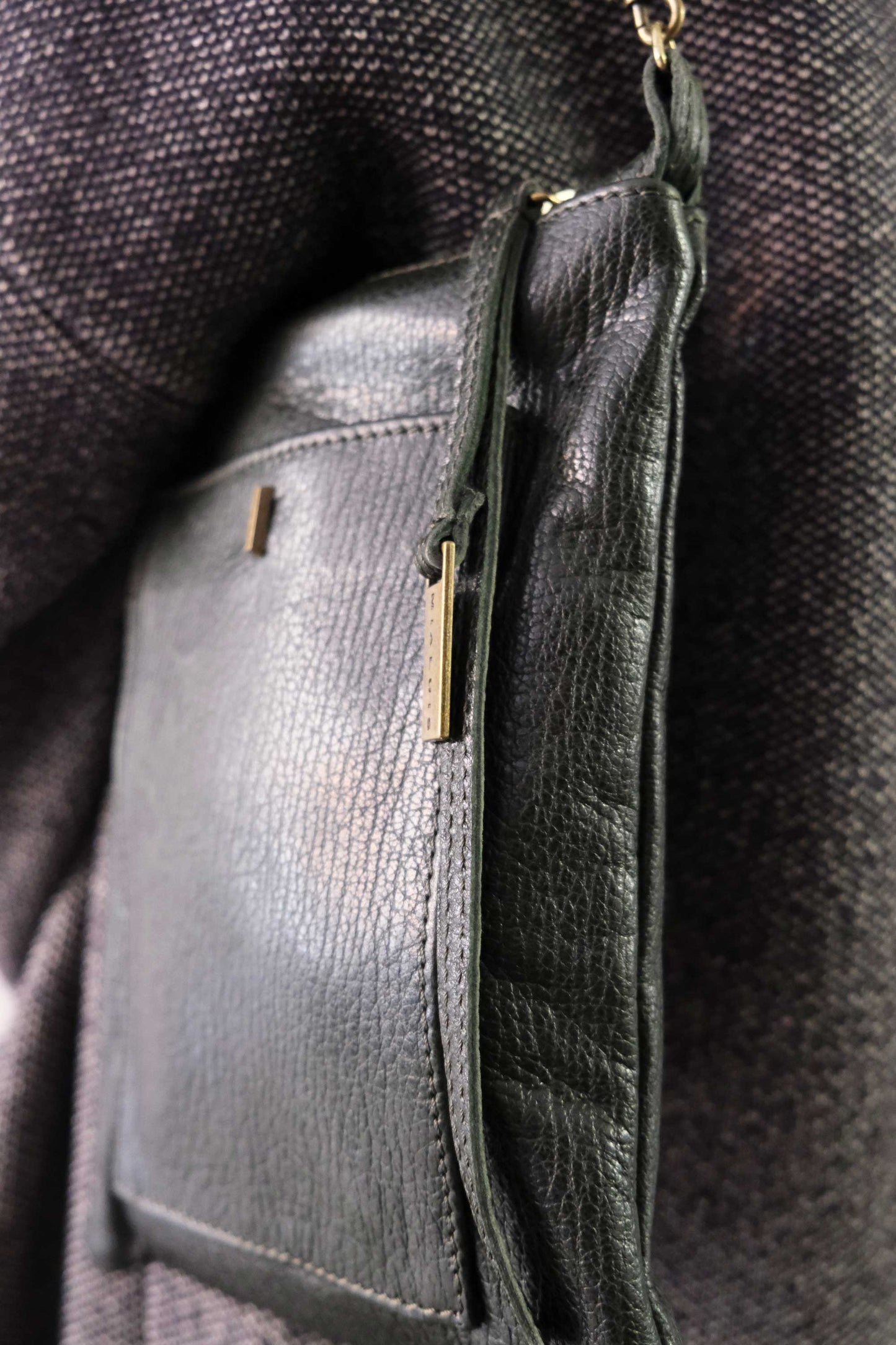 Rina pochette pine green vegetable tanned leather with shark print