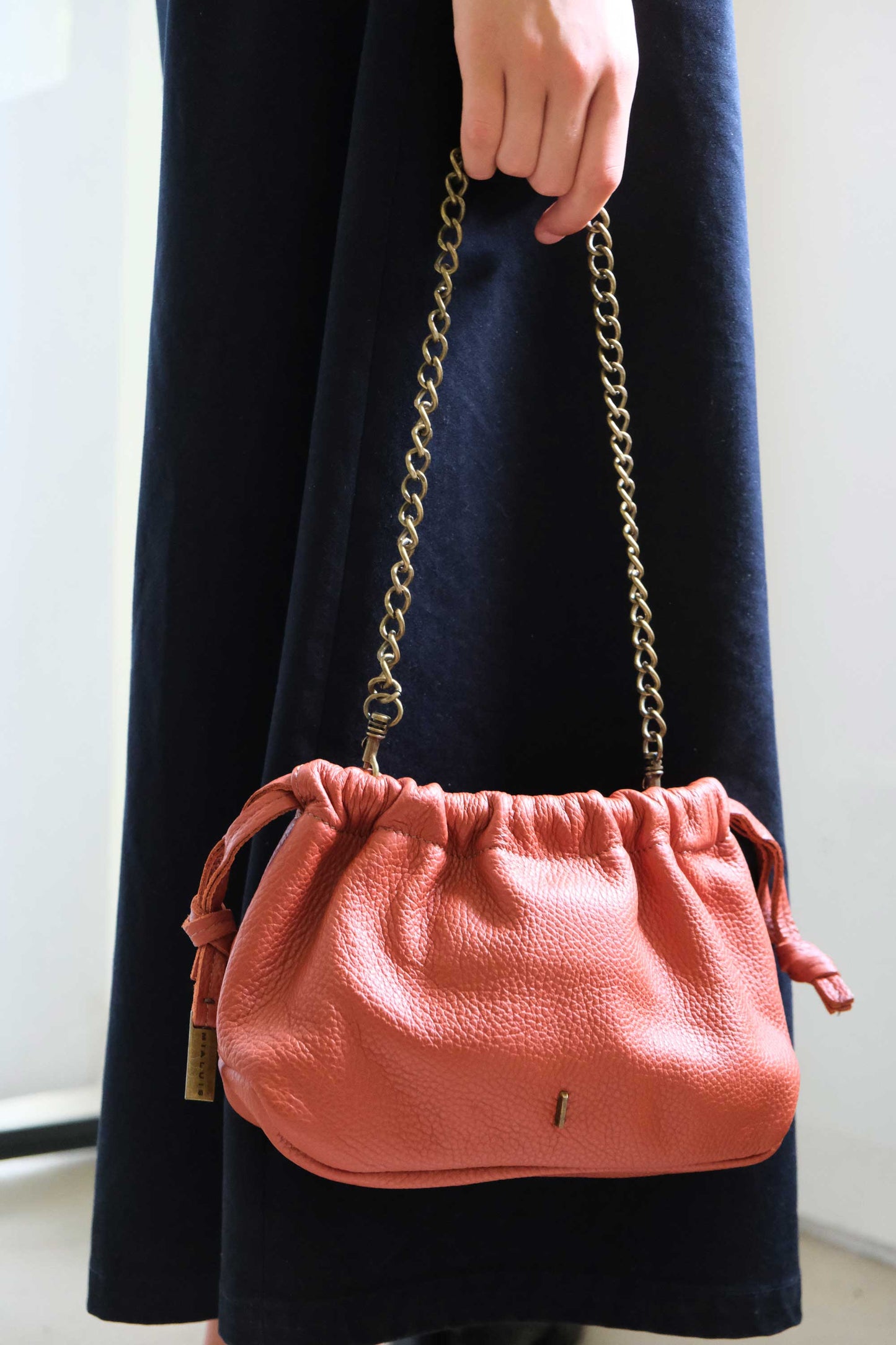 Agnes mini pochette in brick soft leather