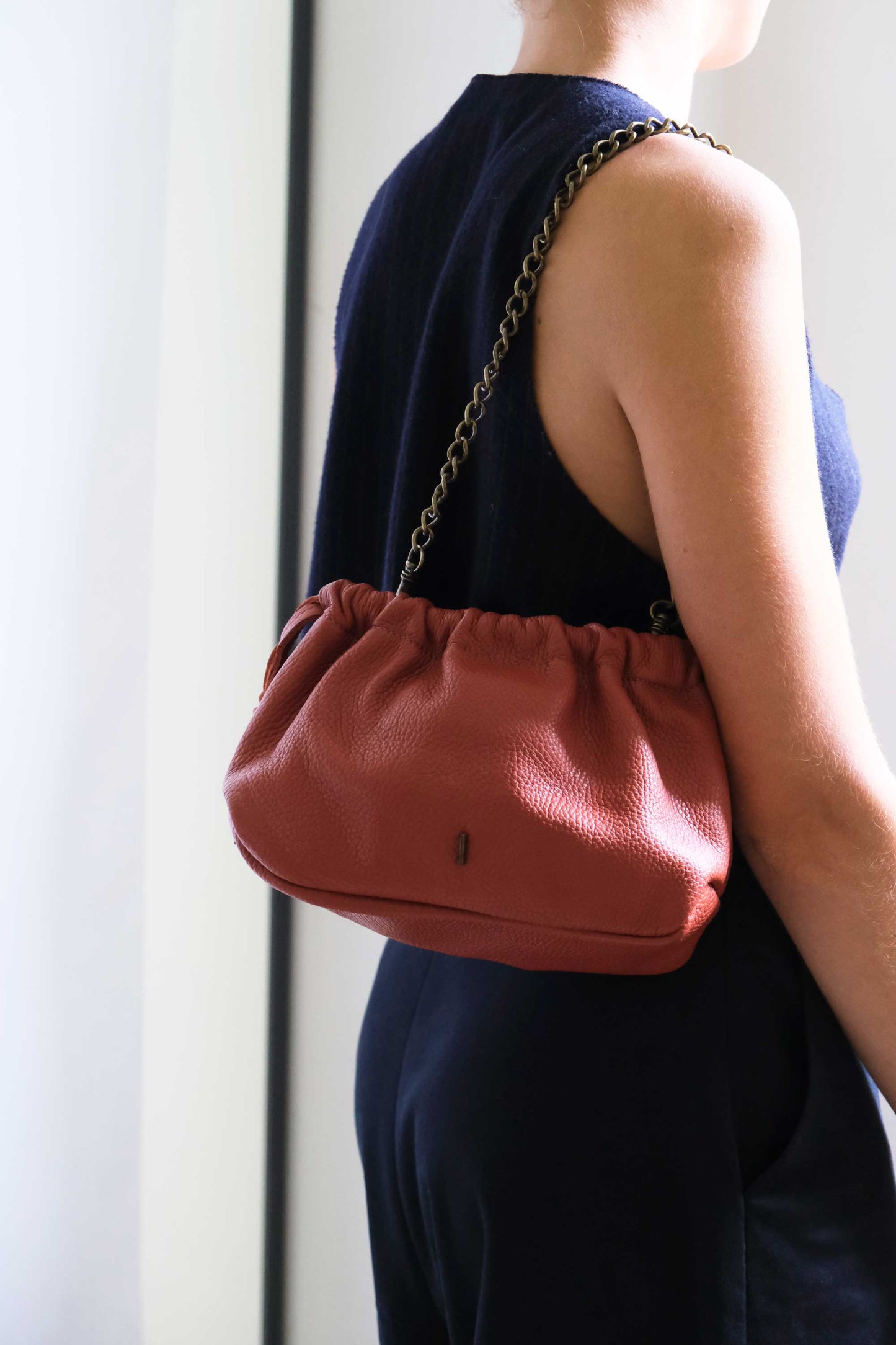 Agnes mini pochette in brick soft leather