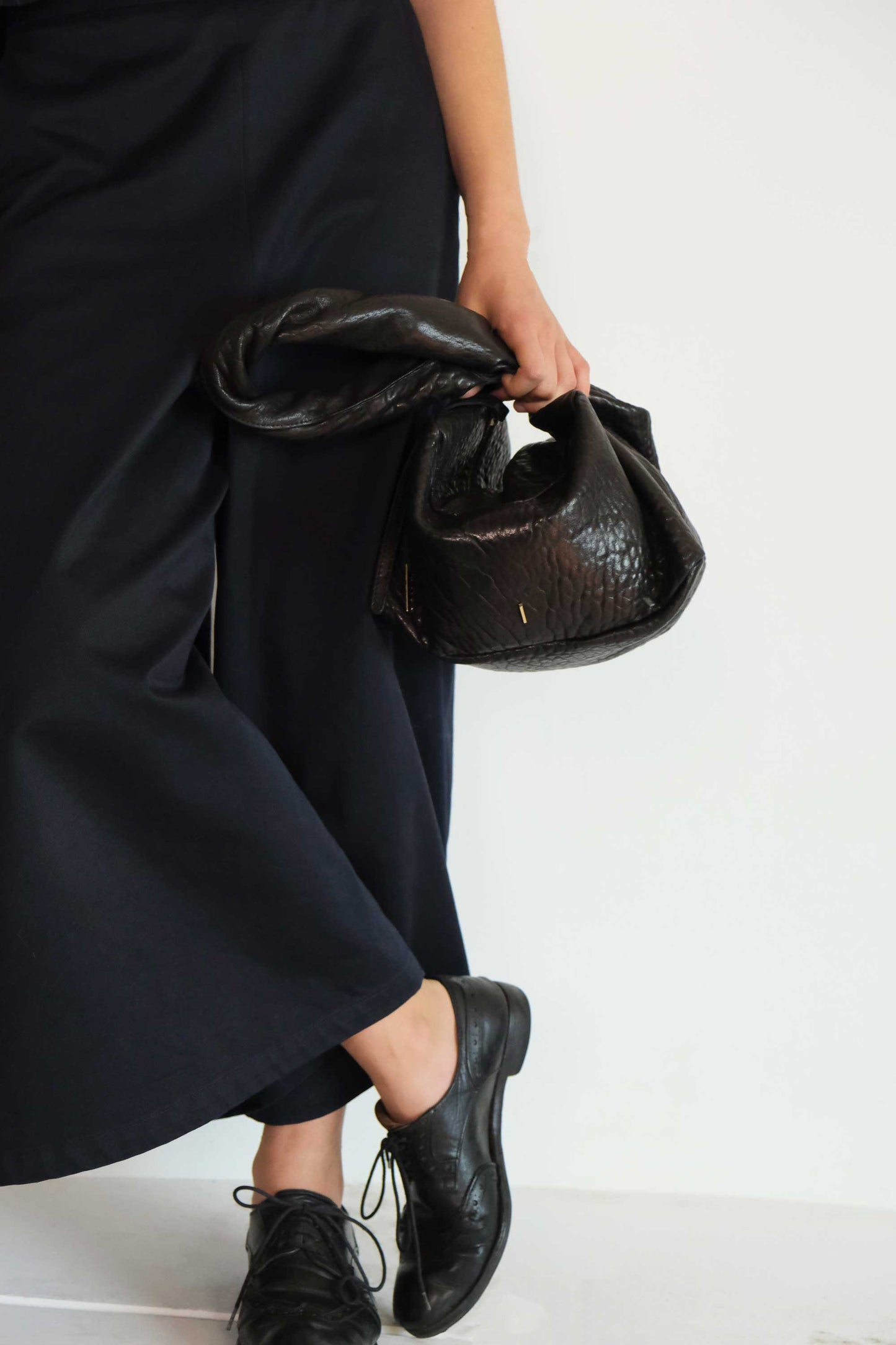 Bobo Torchon top handle bag in mutton vegetable leather