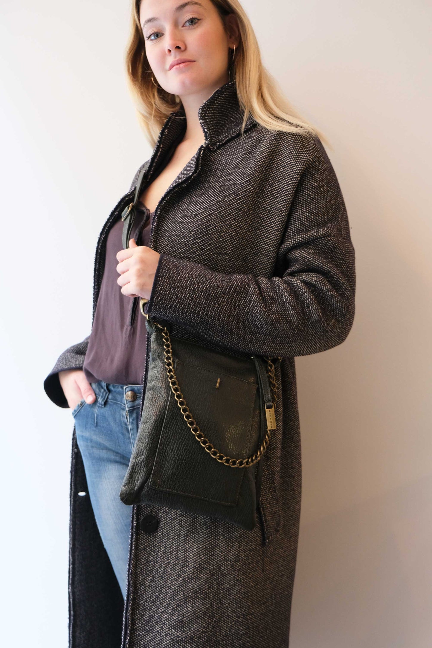Rina pochette pine green vegetable tanned leather with shark print