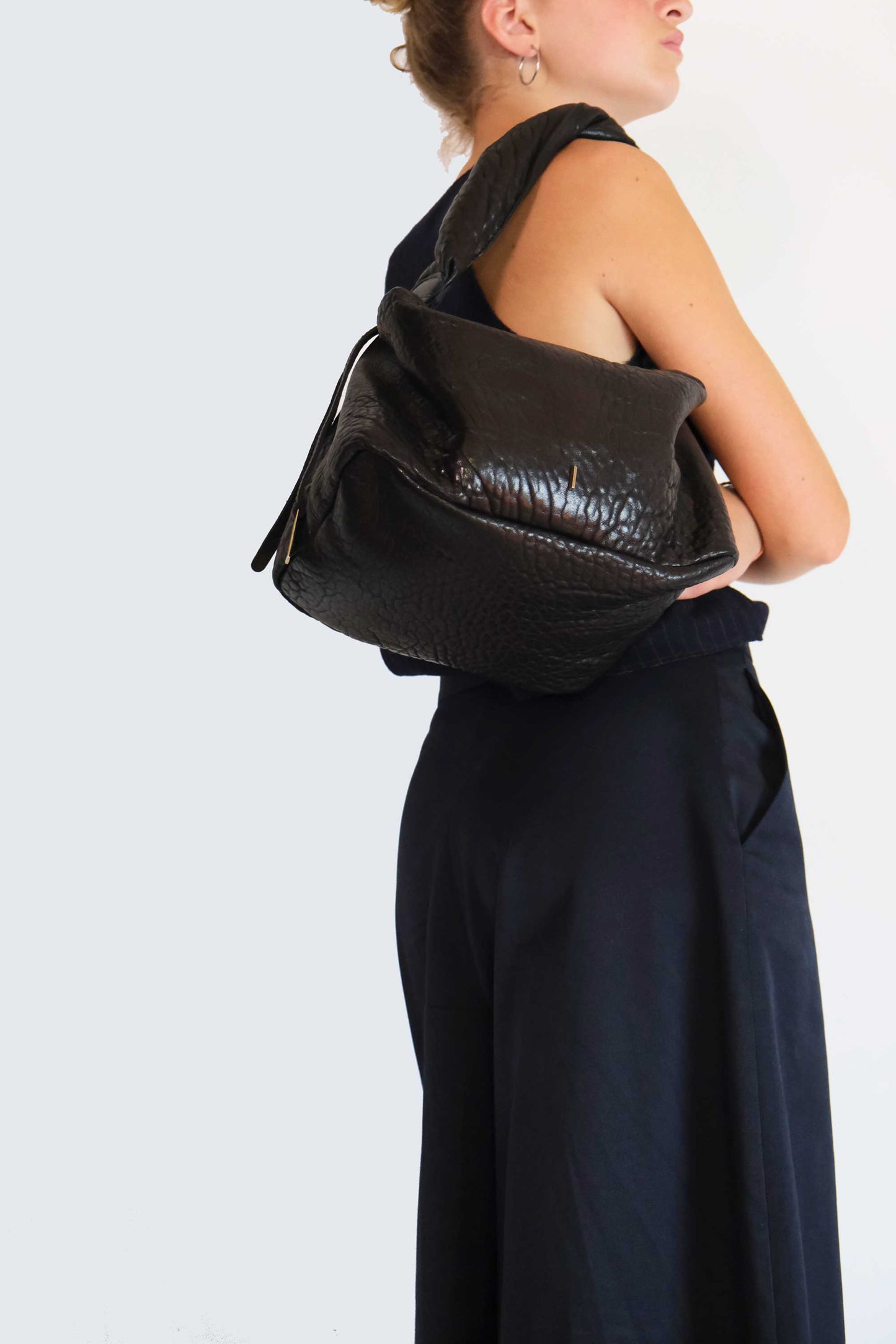 Bobo Torchon top handle bag in mutton vegetable leather