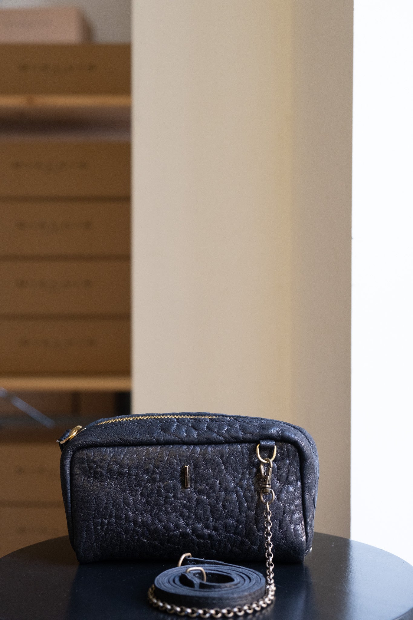 Bombo pochette in in mutton vegetable leather