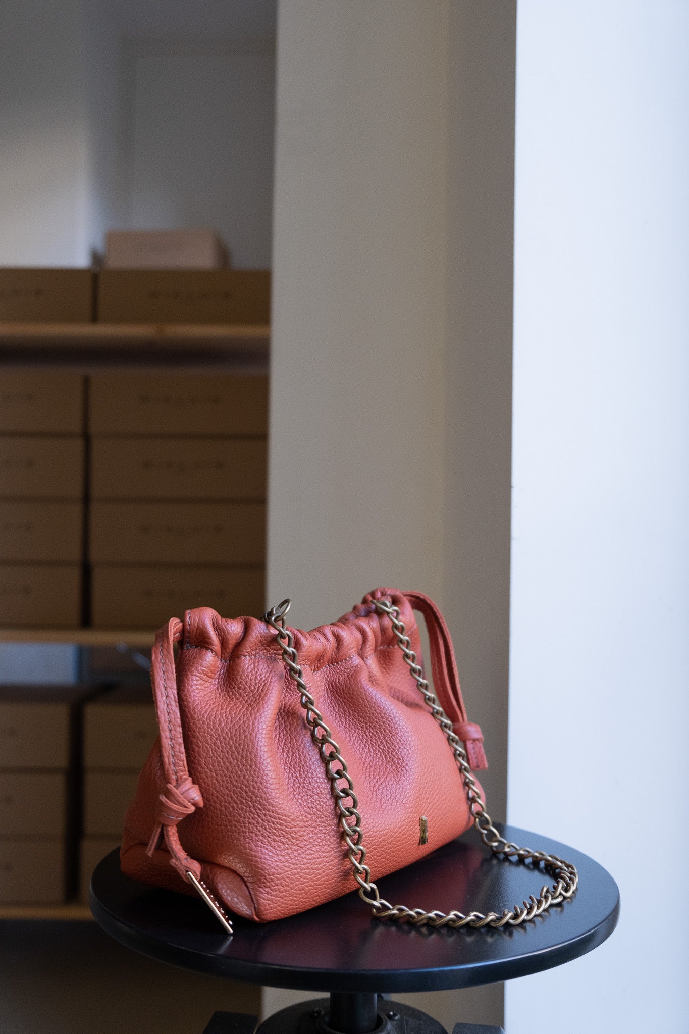 Agnes mini pochette in brick soft leather