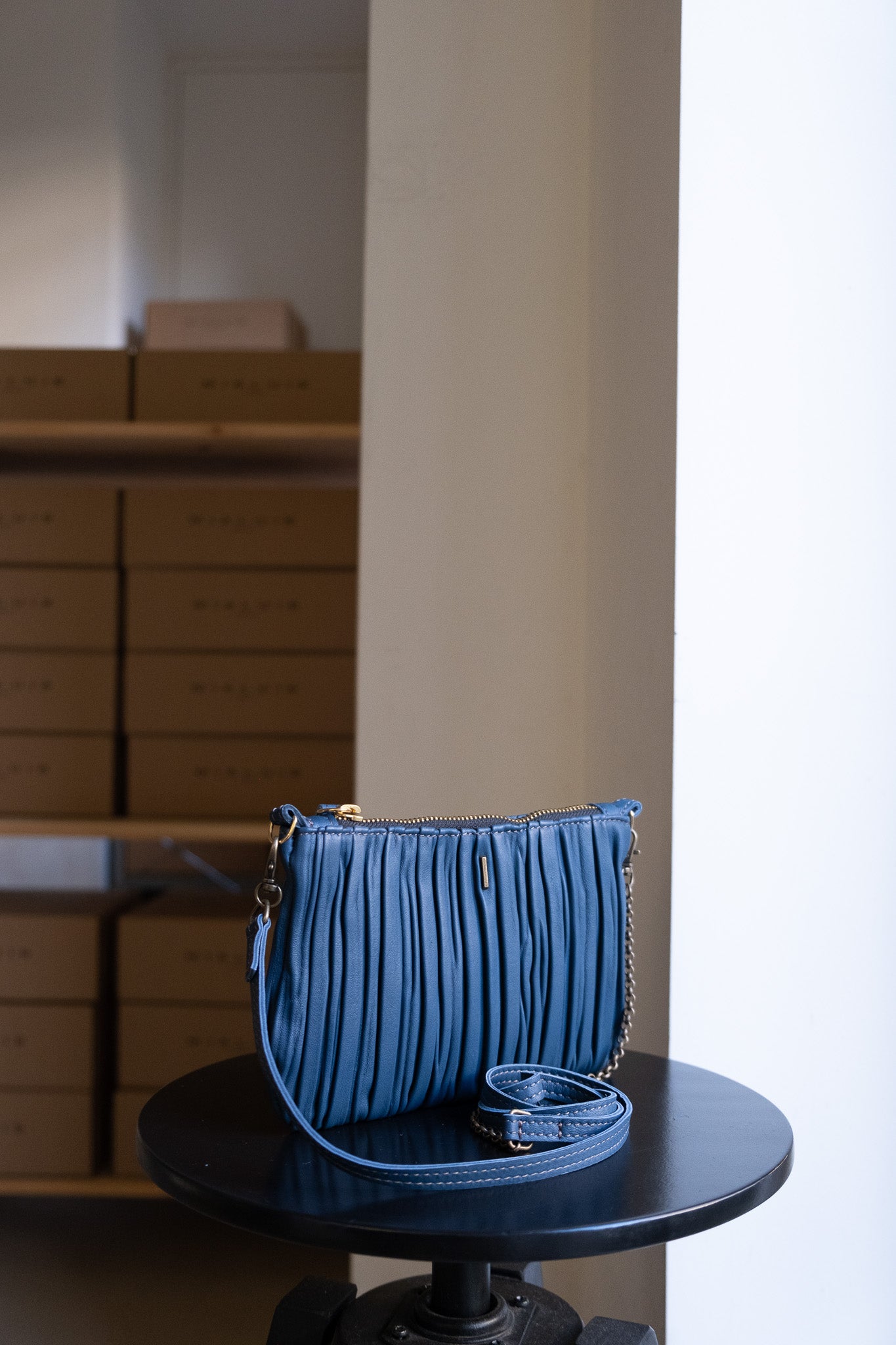 Tina pochette in denim pleated leather