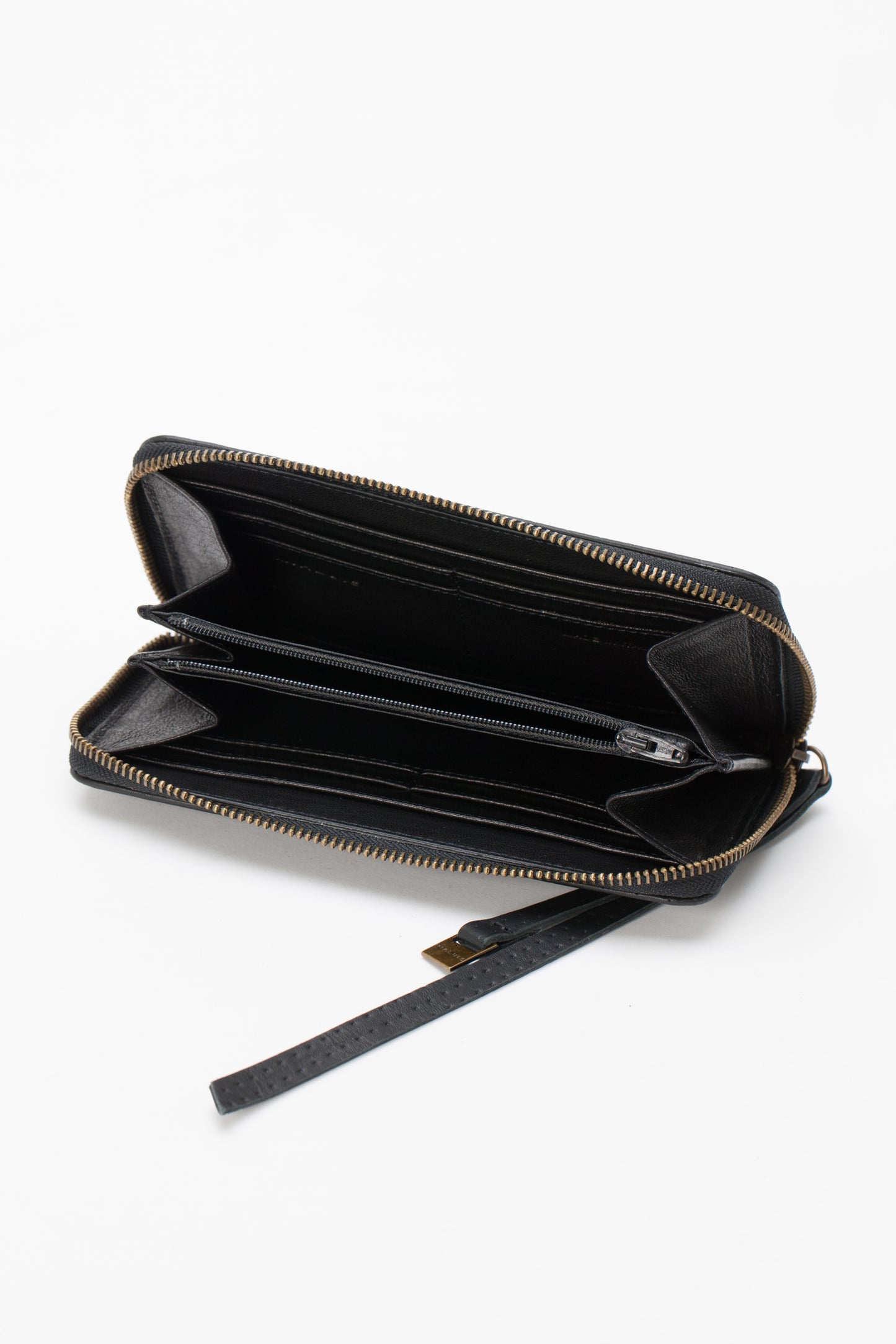 Zip around wallet drilled leather