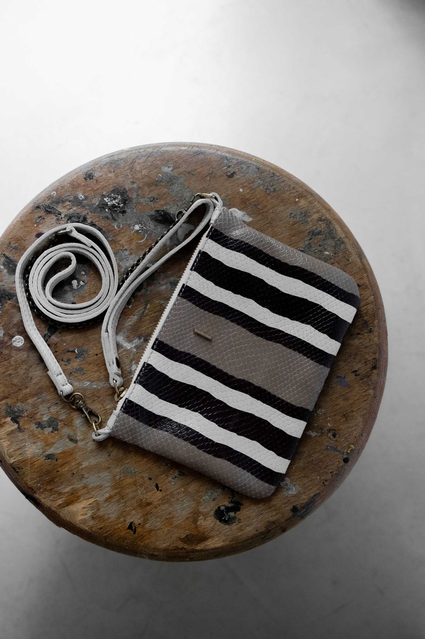 Tina pochette in stripe cream soft leather
