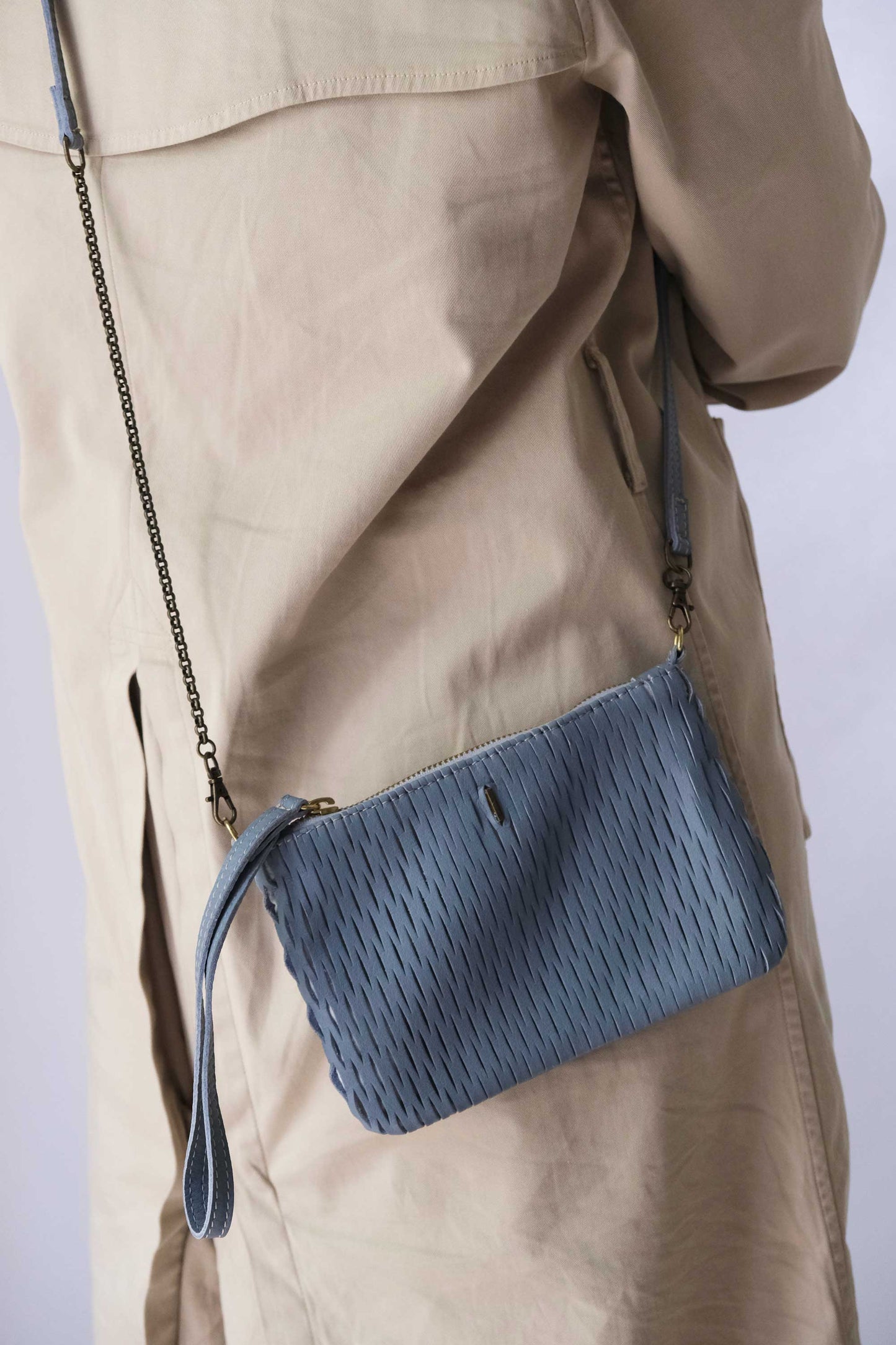 Tina pochette in cielo perforated leather