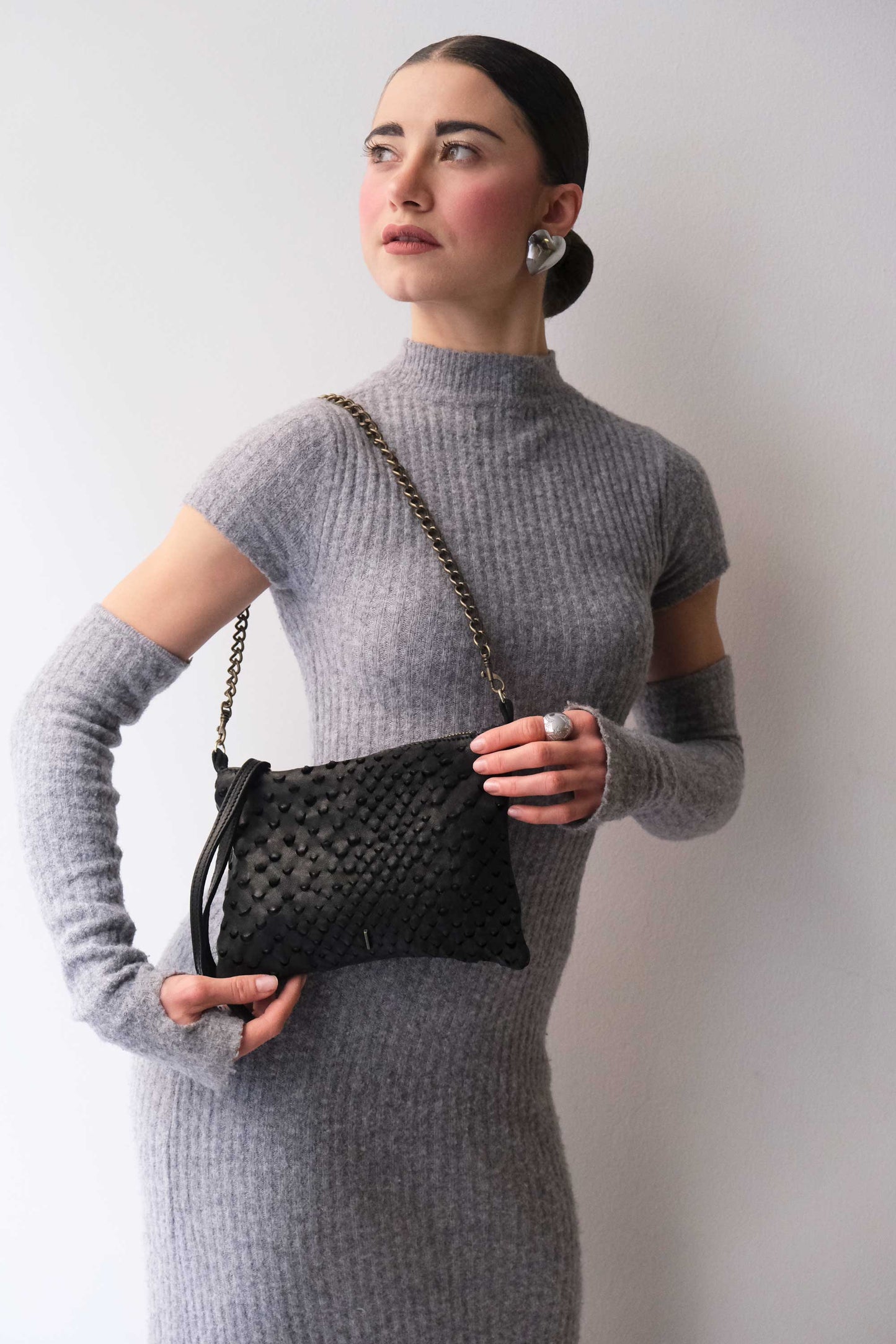 Mikin black pochette in taipan vegetable-tanned leather – Made in Italy -