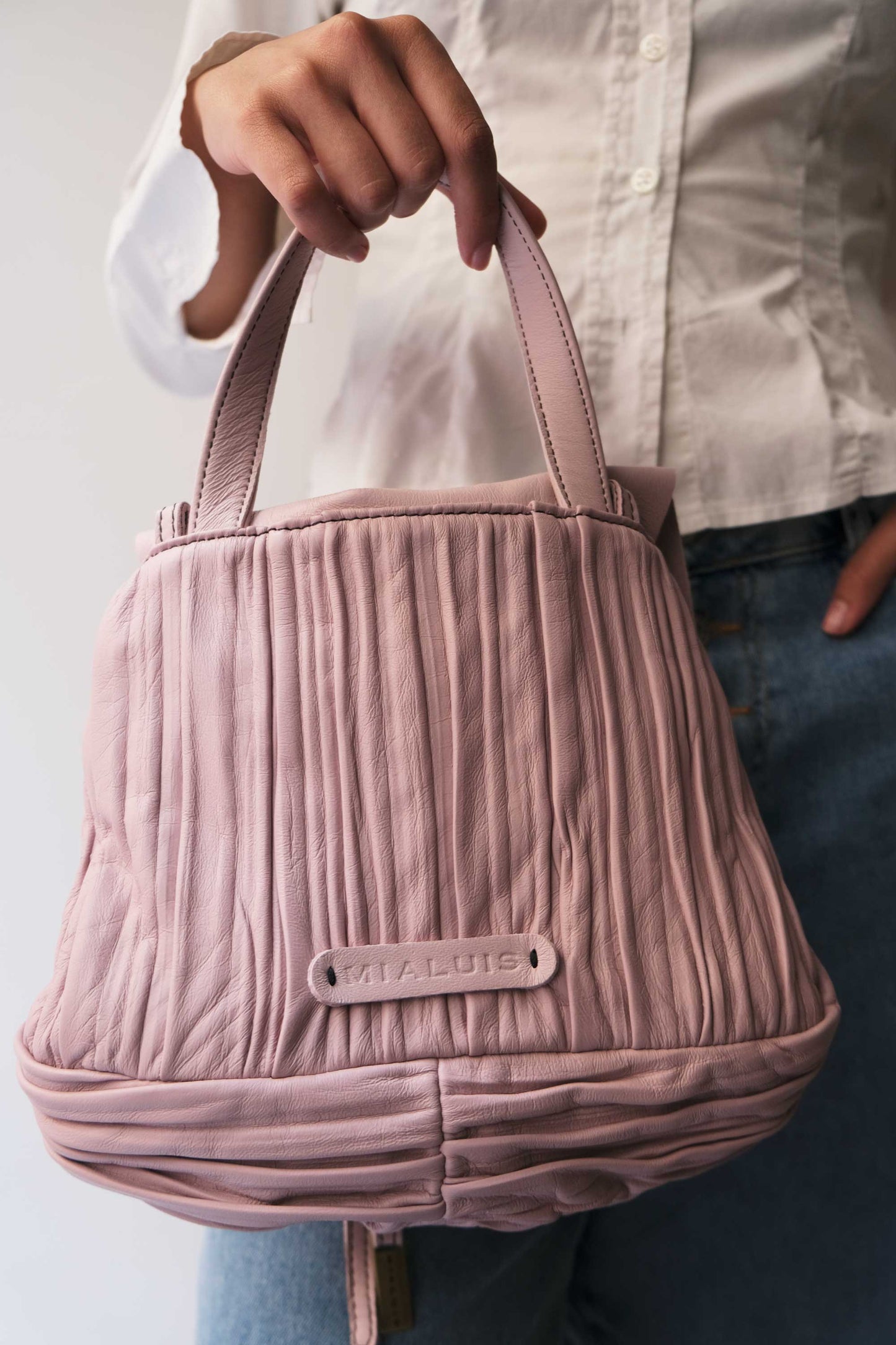 Minu in pleated orchid colour leather