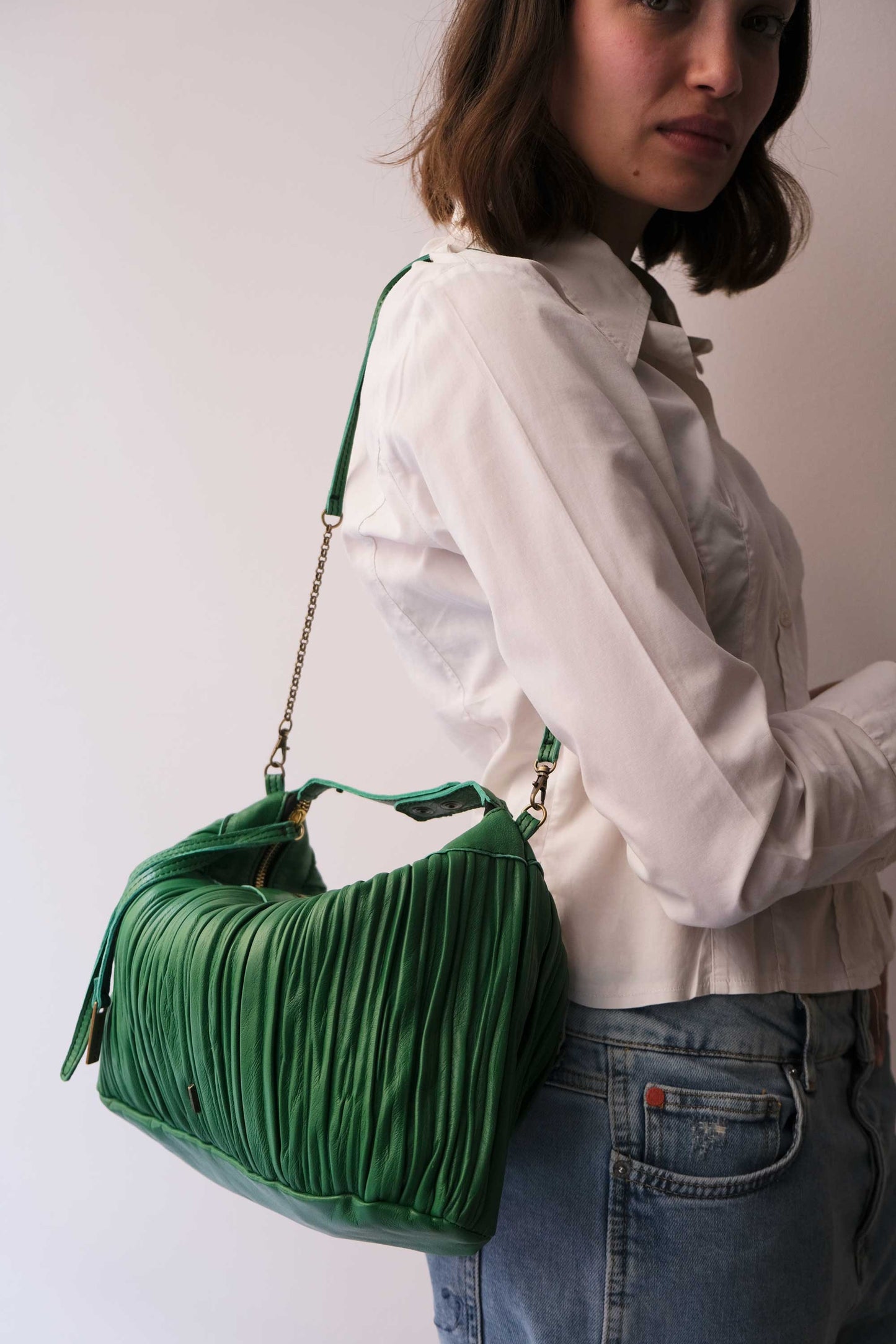 Chicca Media hobo bag in emerald pleated leather