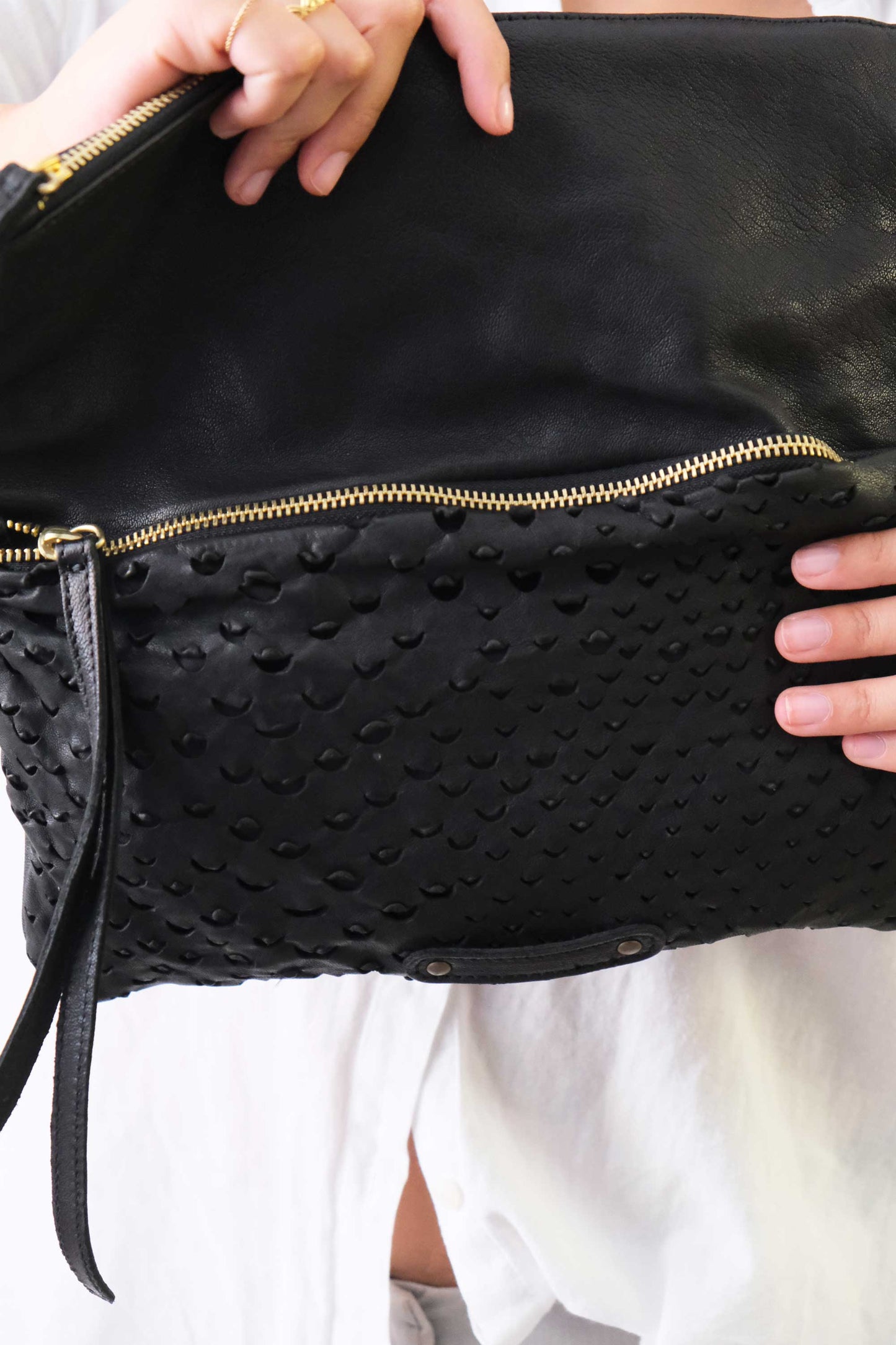 Aida pochette in black perforated nappa