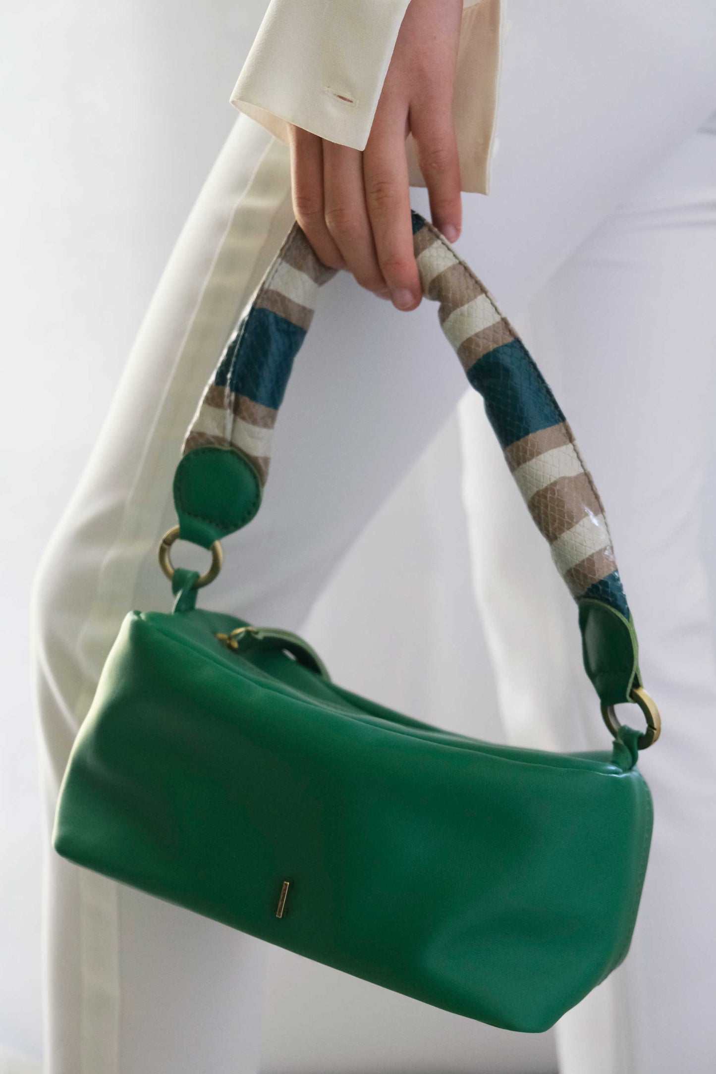Bobo mini emerald green leather with teal striped handle