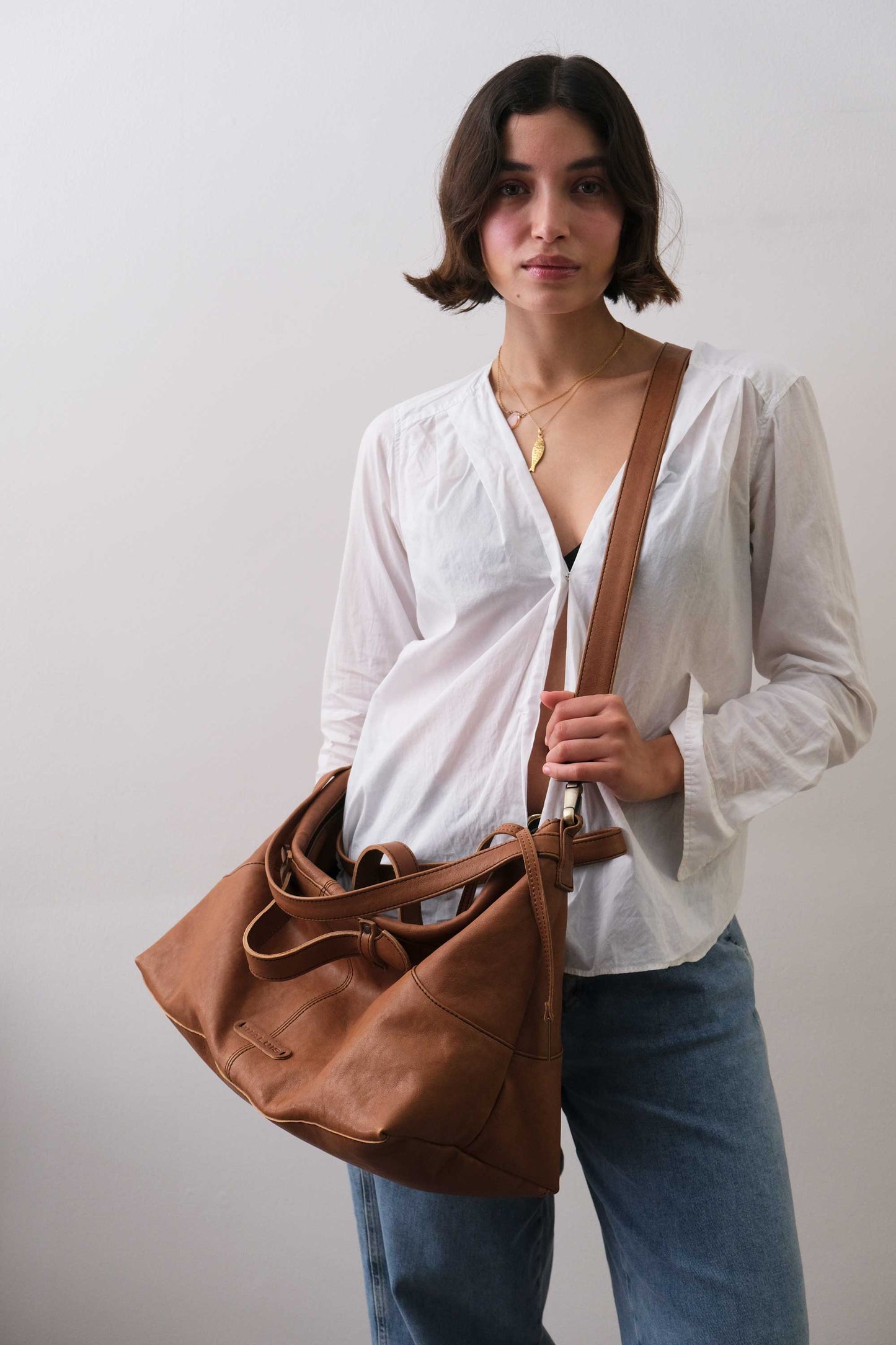 Cloudy crossbody bag in cognac nappa leather - Made in Italy -