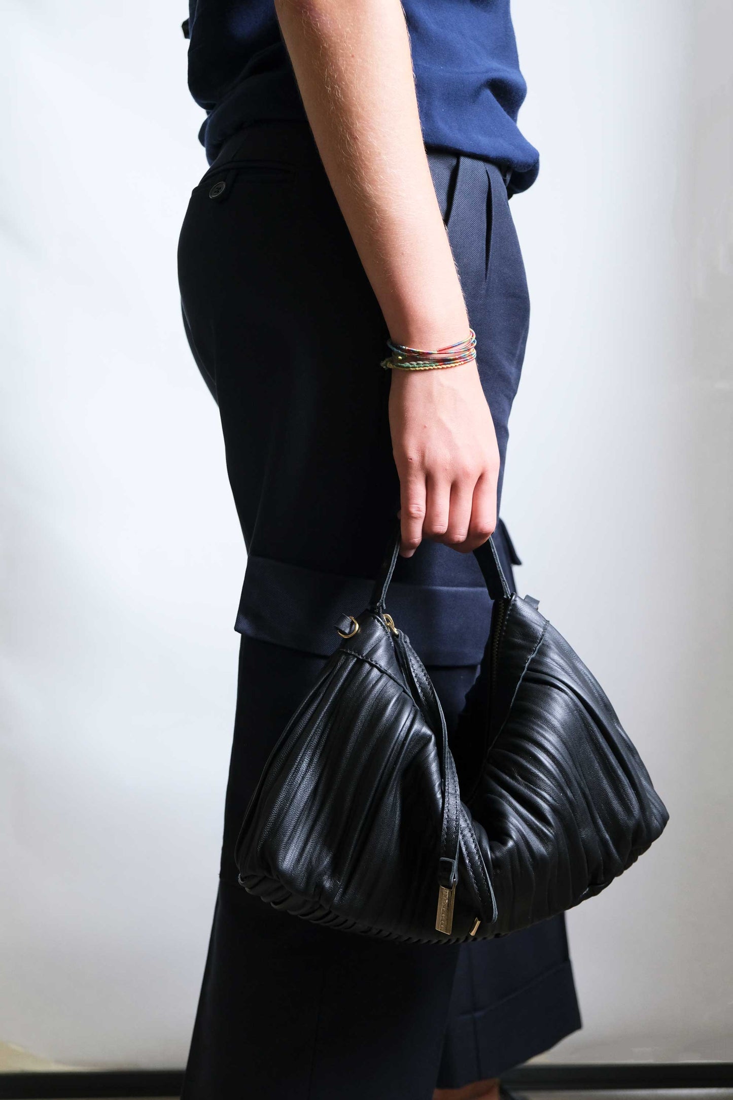 Chicca Media hobo bag in black pleated leather