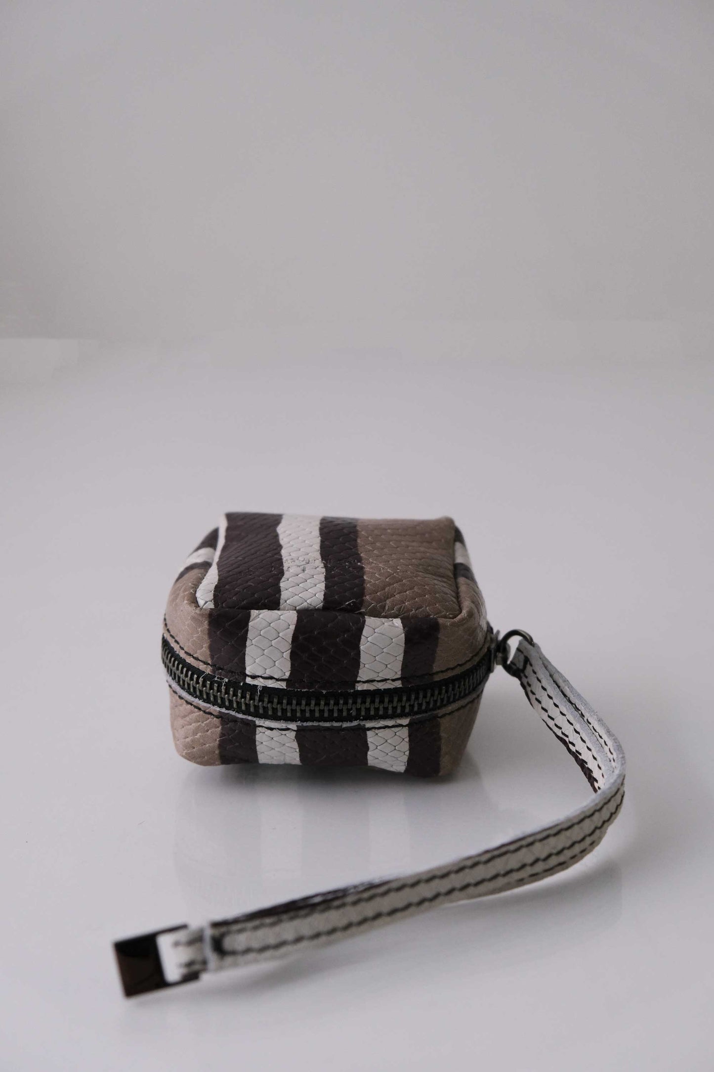 Dream box mini pochette in taupe line soft leather