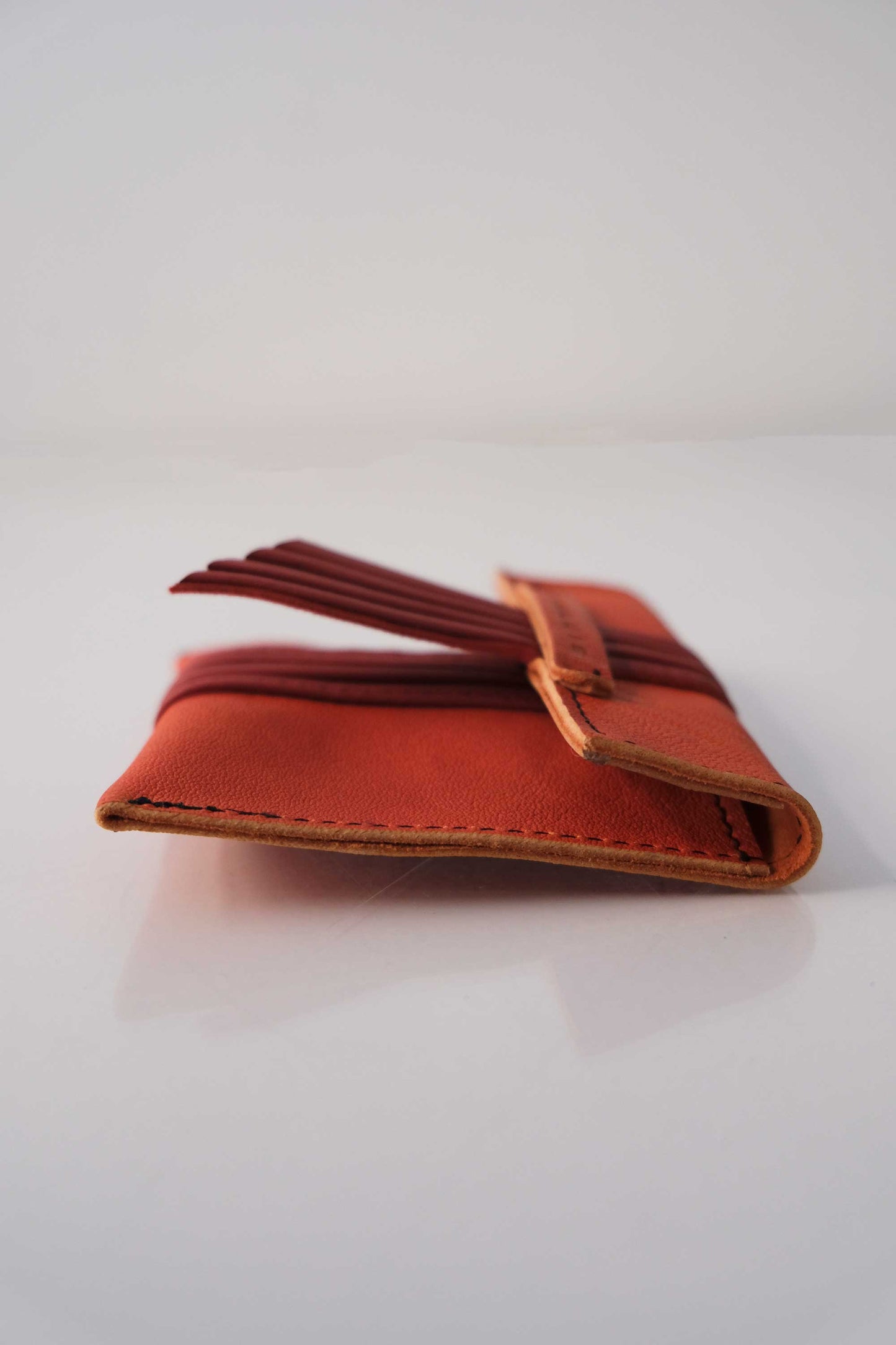 Sound dream mini pochette in papaia-red soft leather