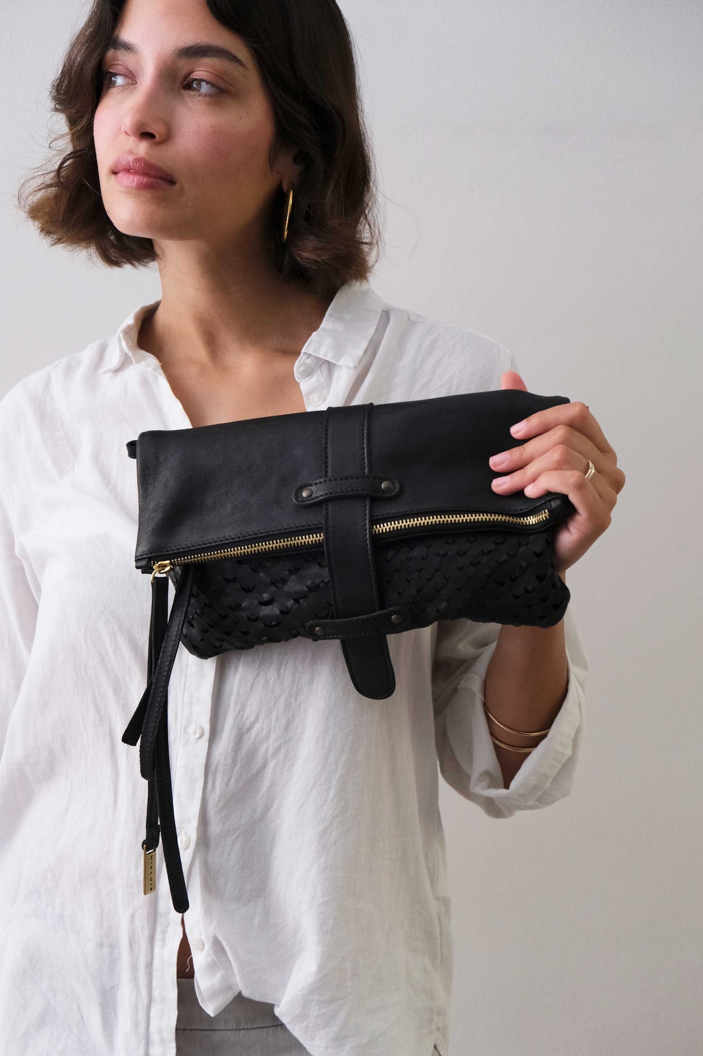 Aida pochette in black perforated nappa