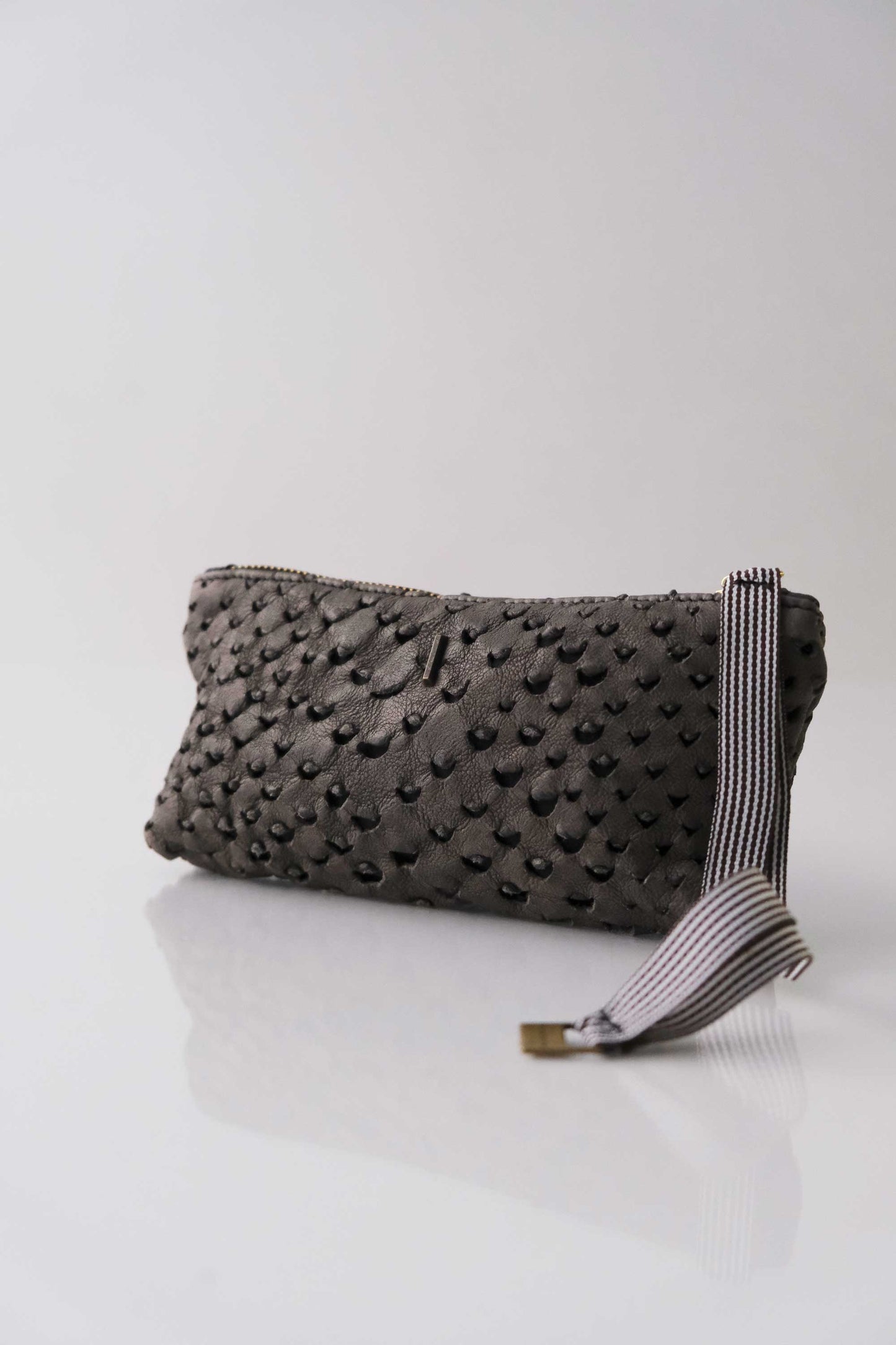 Dream Big soft graphite nappa taipan-effect pochette – The Sustainable Pochette – Made in Italy