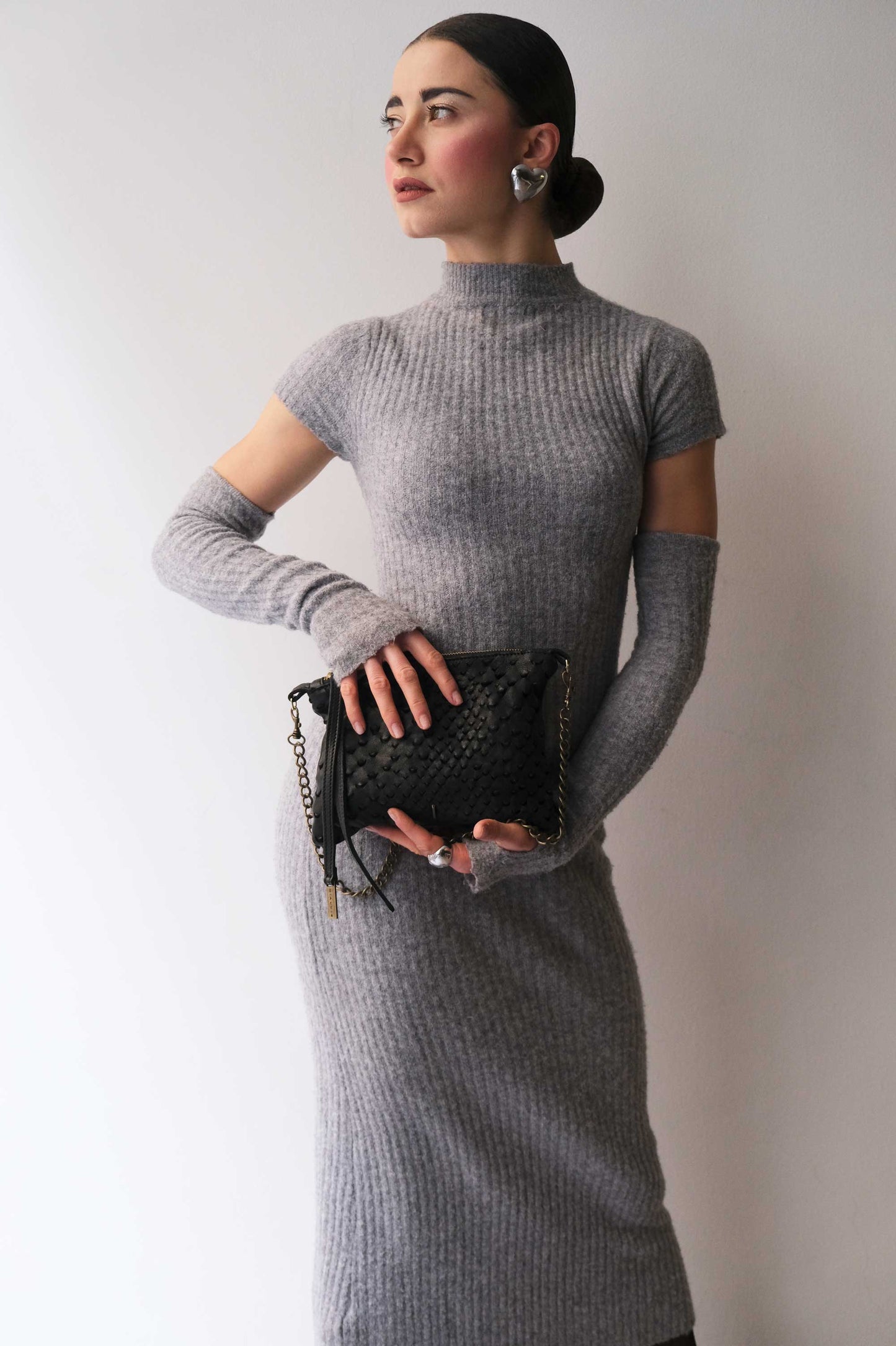 Mikin black pochette in taipan vegetable-tanned leather – Made in Italy -