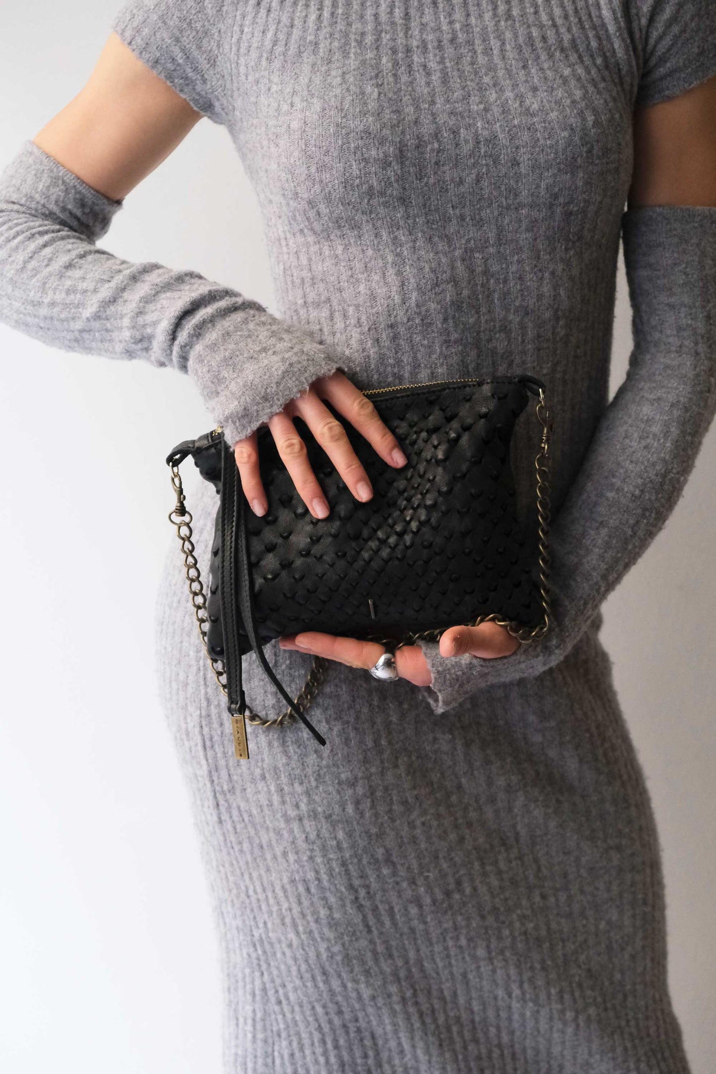 Mikin black pochette in taipan vegetable-tanned leather – Made in Italy -