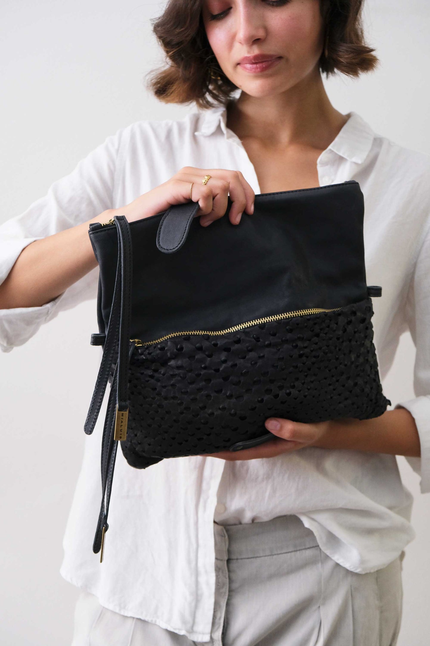 Aida pochette in navy perforated nappa