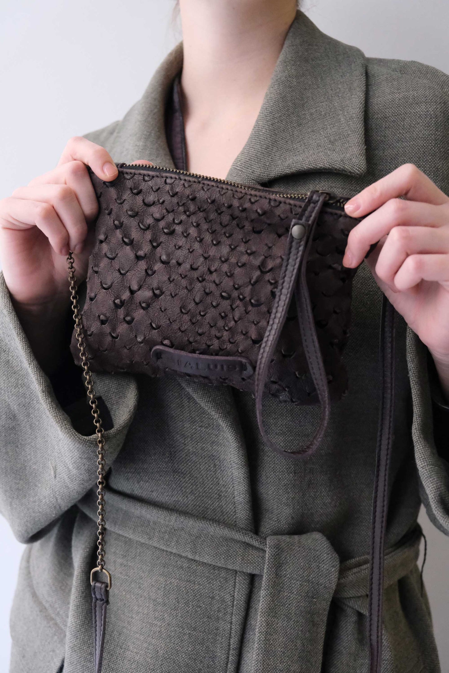 Tina pochette in brown perforated leather