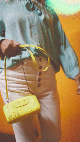 Bombo pochette in fluo yellow leather