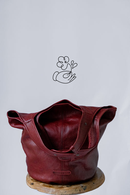 Lena tote bag in habanero leather | fundraising project for Colori Vivi