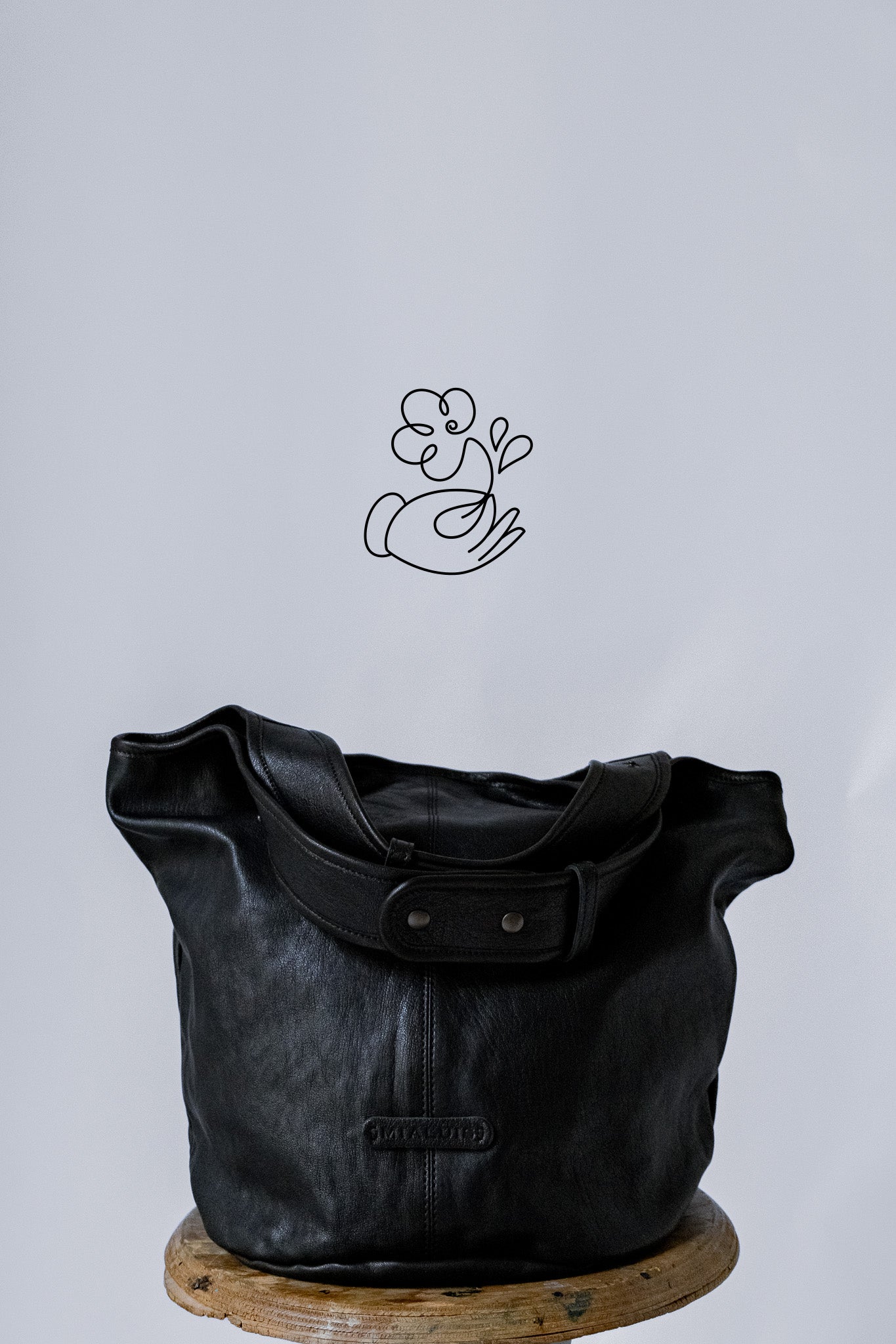 Lena tote bag in black nappa leather | fundraising project for Colori Vivi